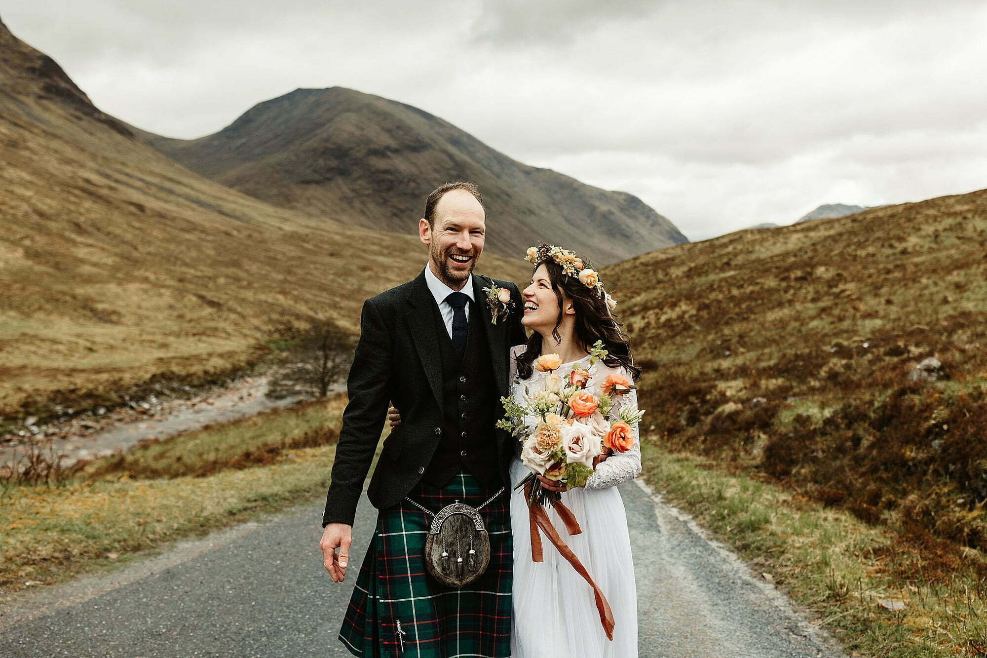 glencoe elopement photography bride groom long sleeve lace wedding dress orange bouquet floral headband