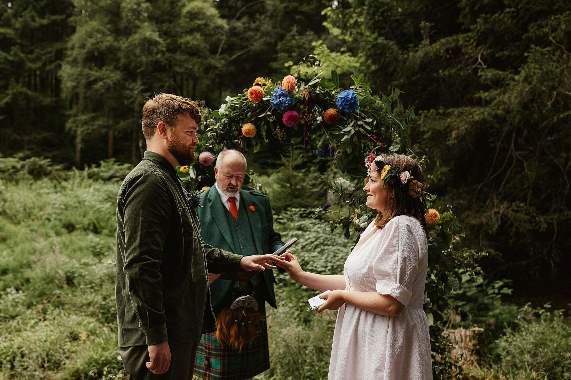glen dye outdoor ceremony humanist wedding ring exchange hays flowers floral crown neil lynch celebrant