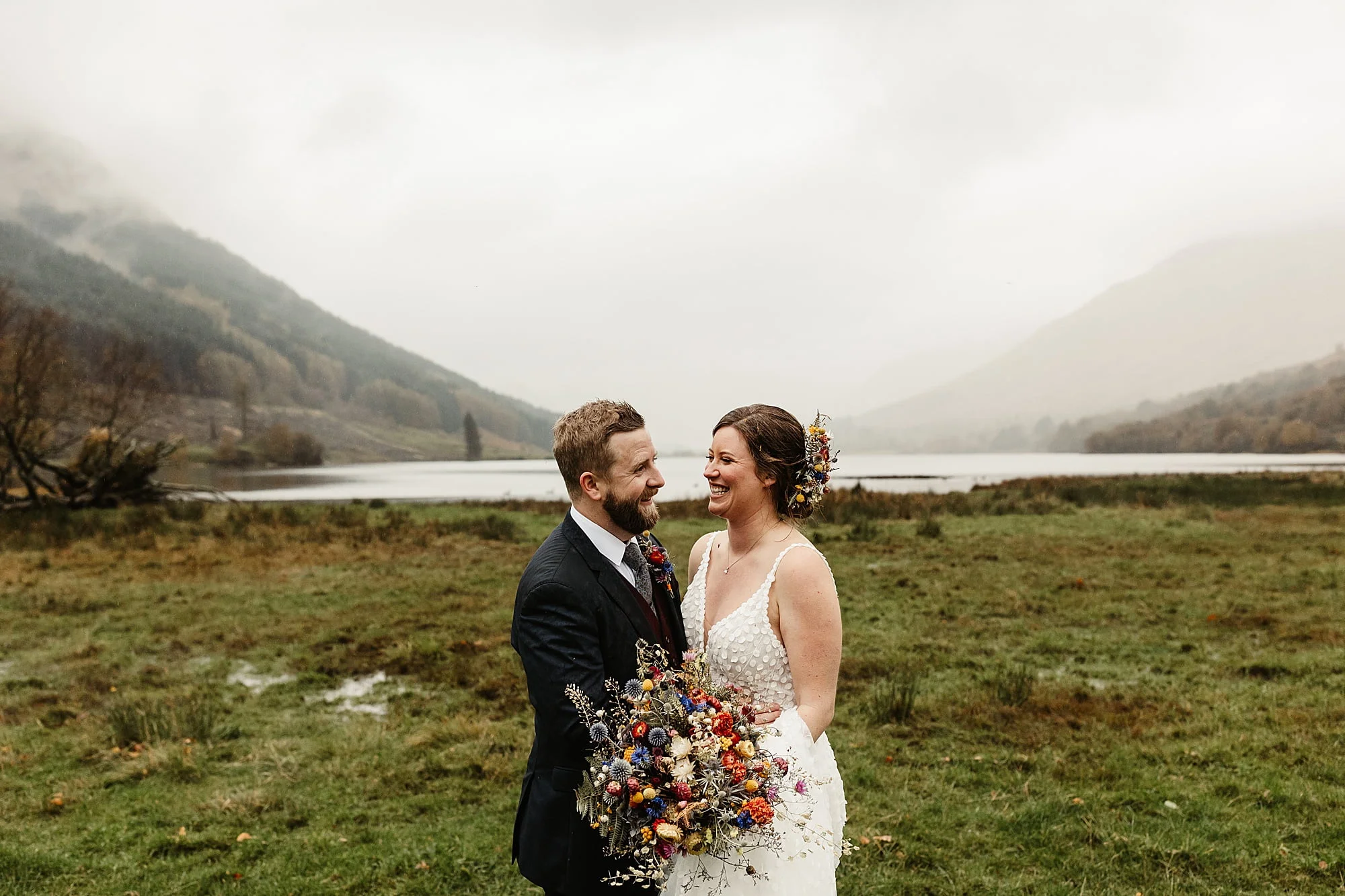 couple portraits photos bride and groom monachyle mhor Layla Robinson Design dried flower bouquet Ivory Grace Bridal wedding dress