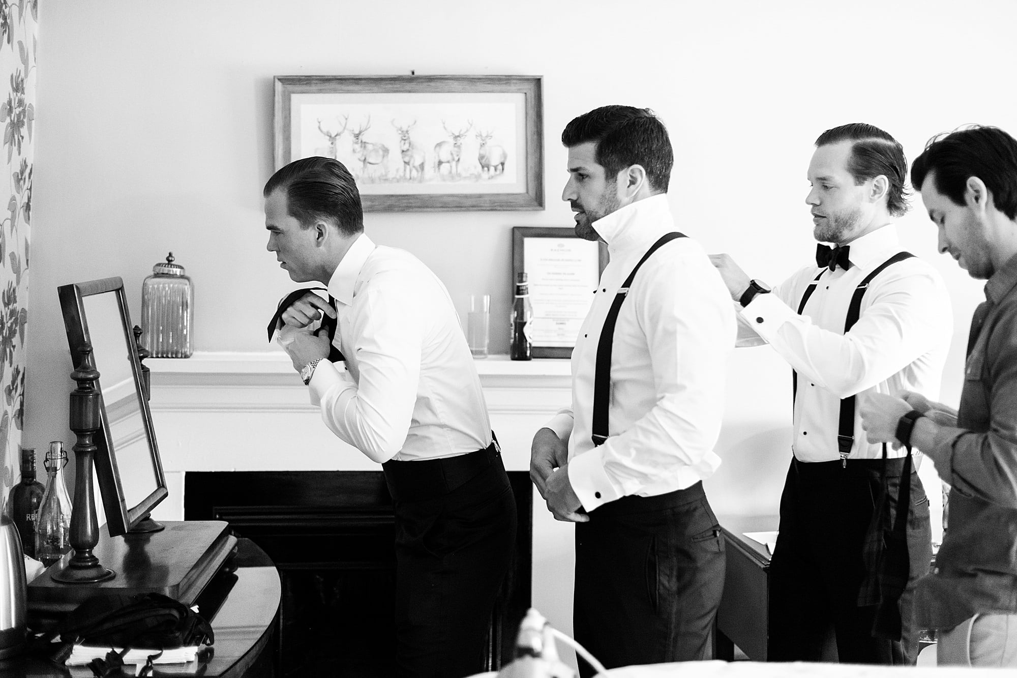 groom and groomsmen getting ready raemoir house Zegna suit