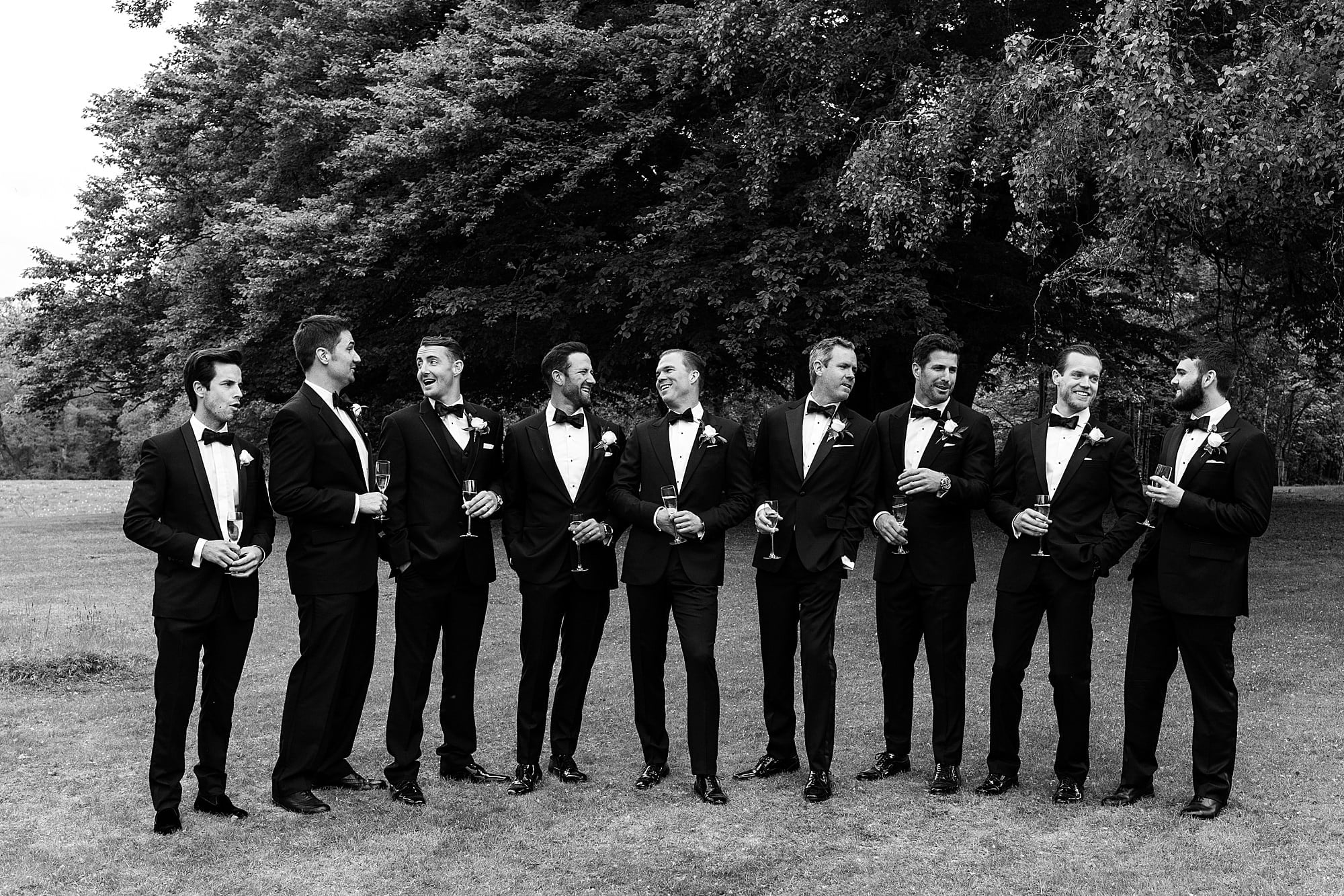 raemoir house wedding photography group photo casual groomsmen tuxedo Zegna suit outdoors