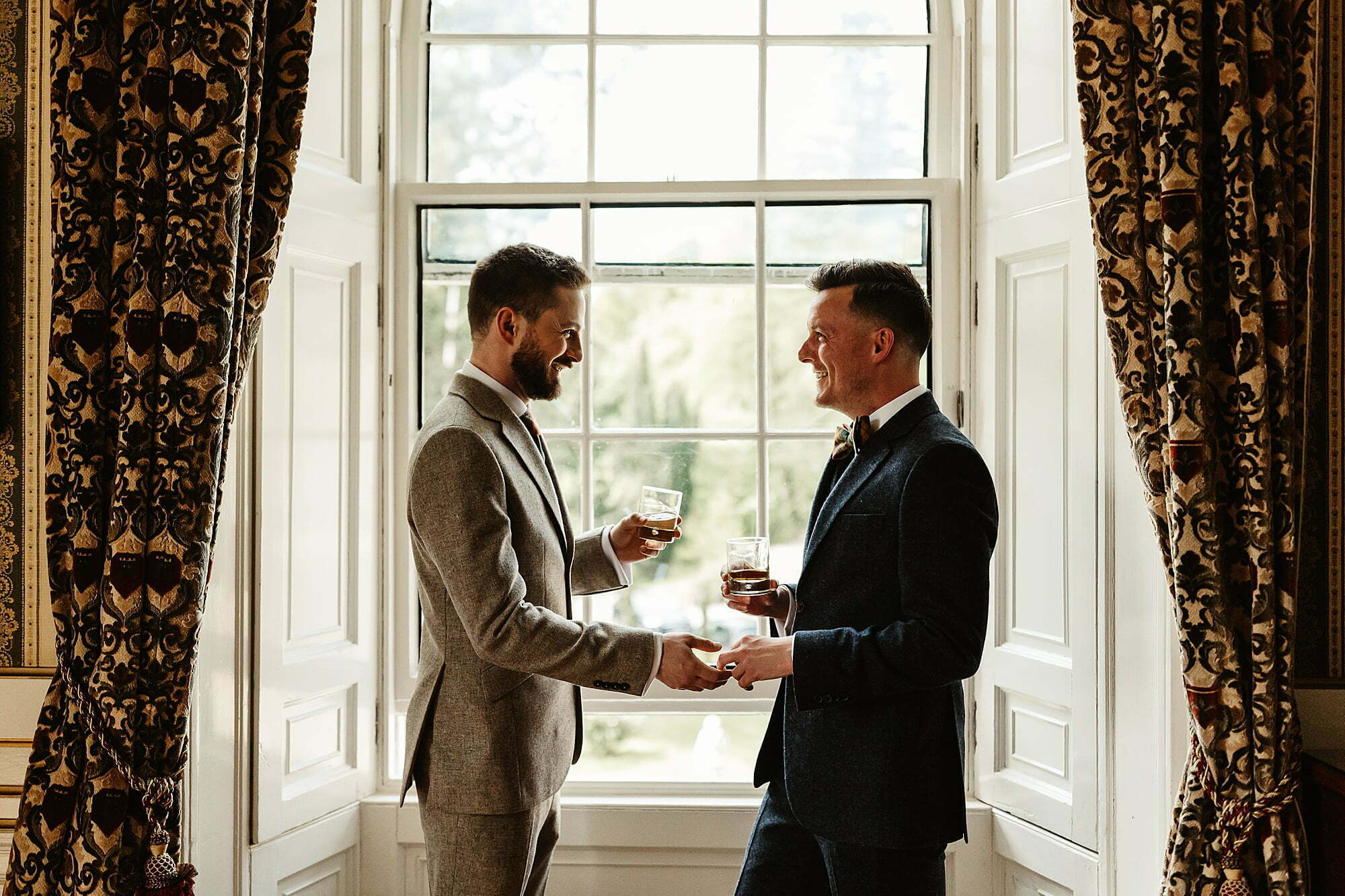 groom preps getting ready drumtochty castle wedding walker slater suits couple portraits same sex