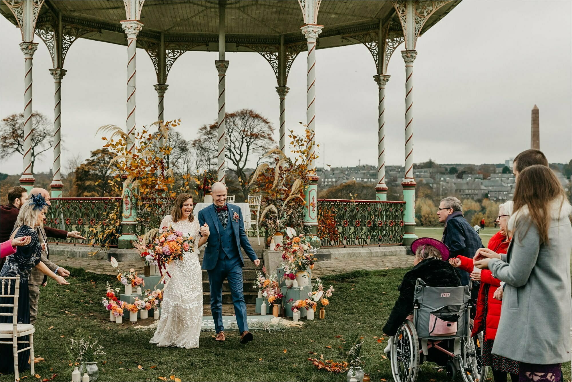 Duthie Park bandstand aberdeen micro wedding bride groom just married confetti back down aisle