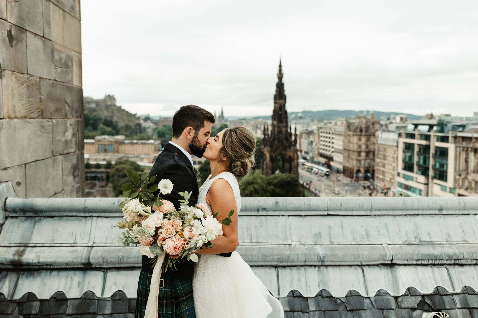 the balmoral edinburgh wedding rooftop city backdrop bride groom portrait