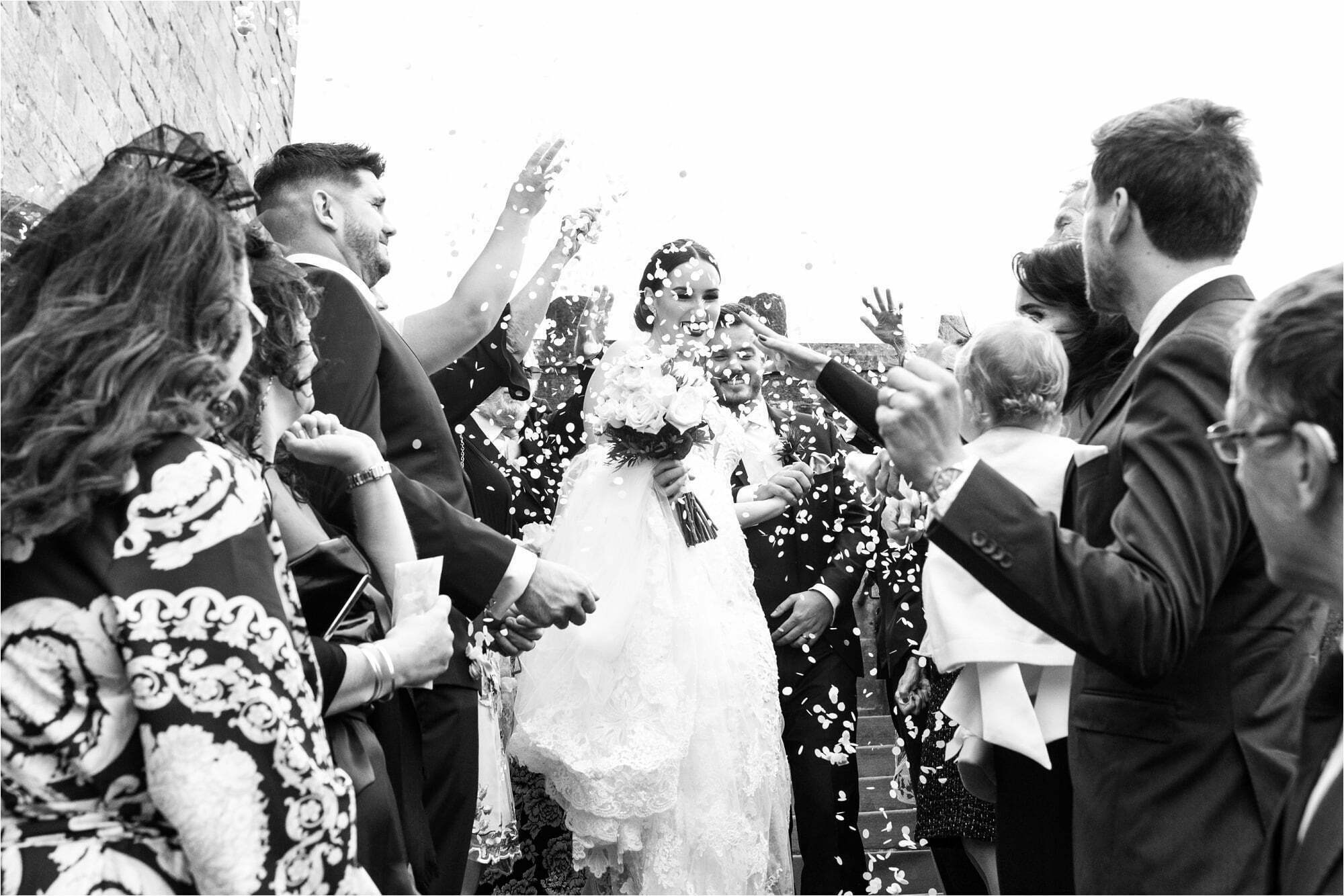 borthwick castle micro wedding bride groom confetti