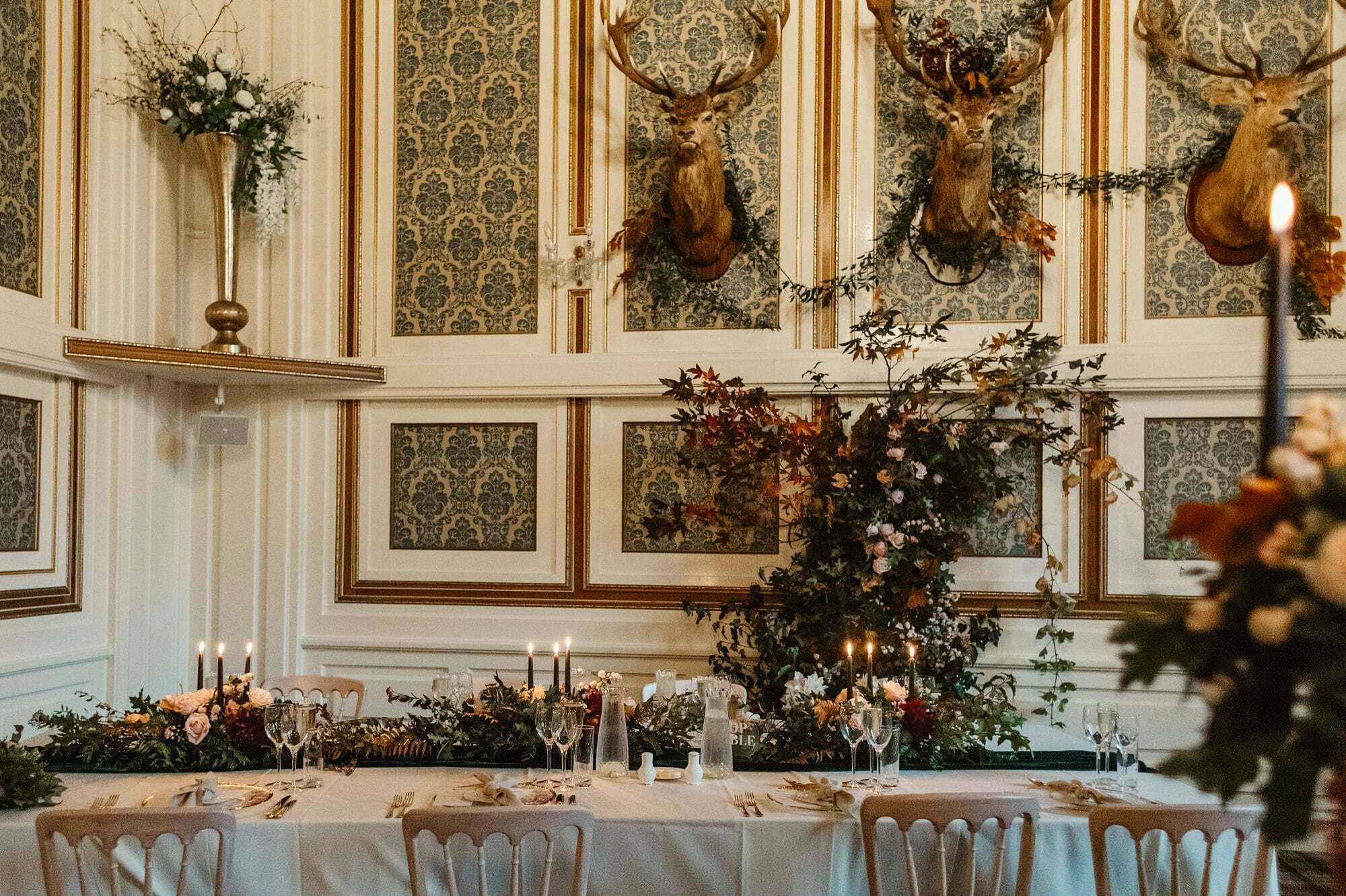 drumtochty castle wedding grand ballroom wedding set up top table florals myrtle and bracken