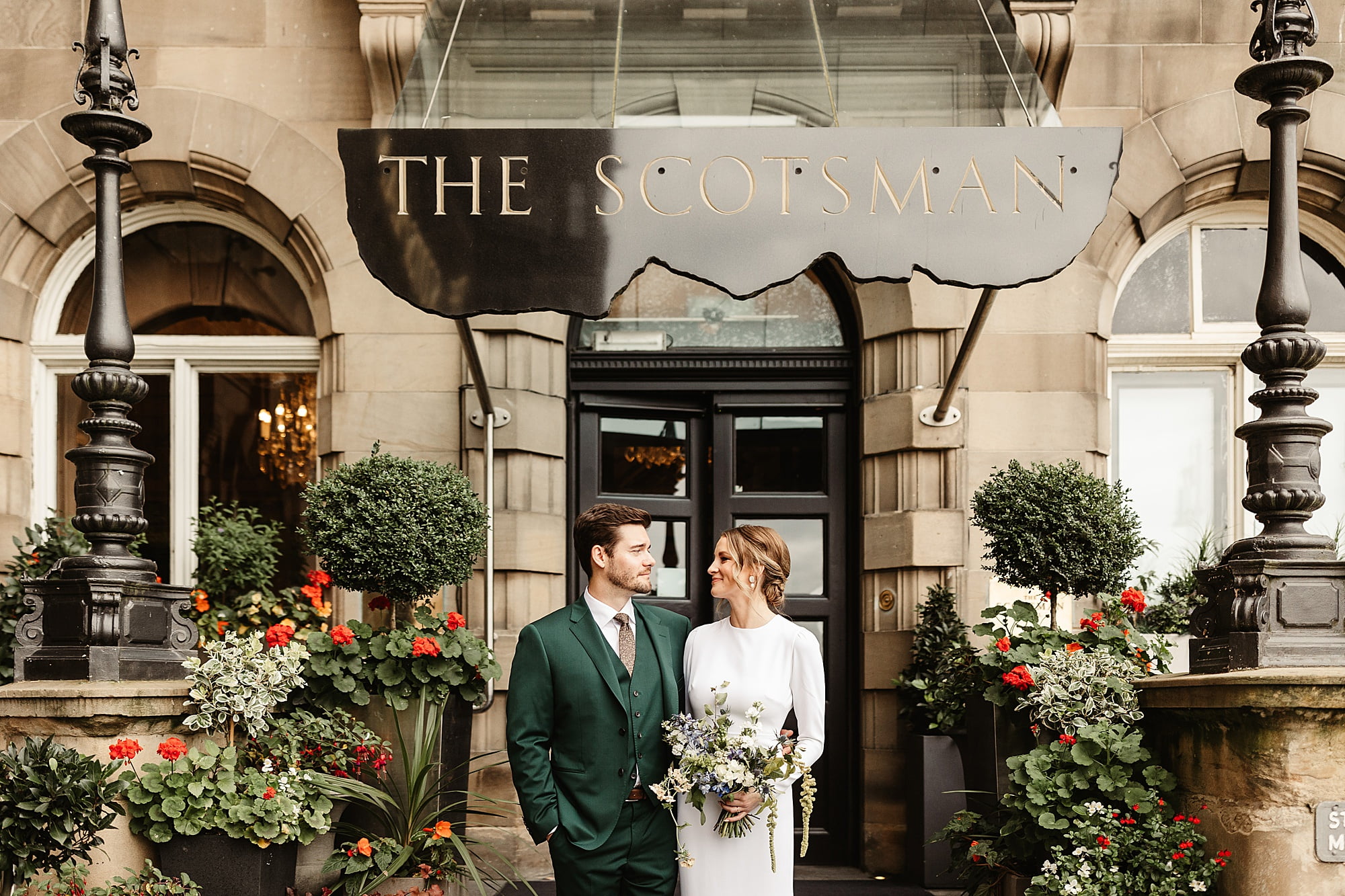 the scotsman hotel micro wedding Narcissus Flowers bouquet Park and Fifth Co dress bride and groom photo portrait
