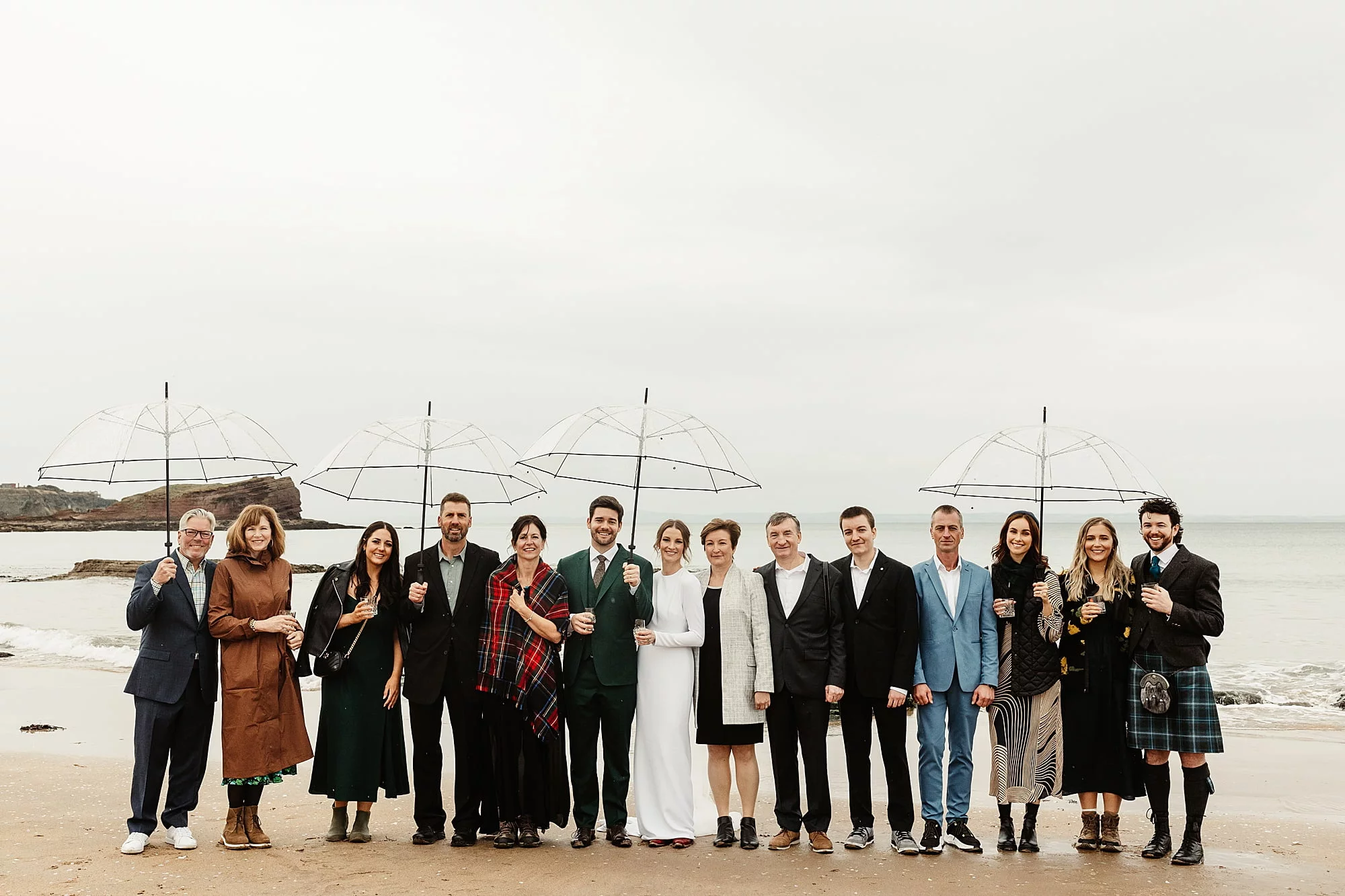 seacliff beach micro wedding ceremony family group photo photography umbrella's