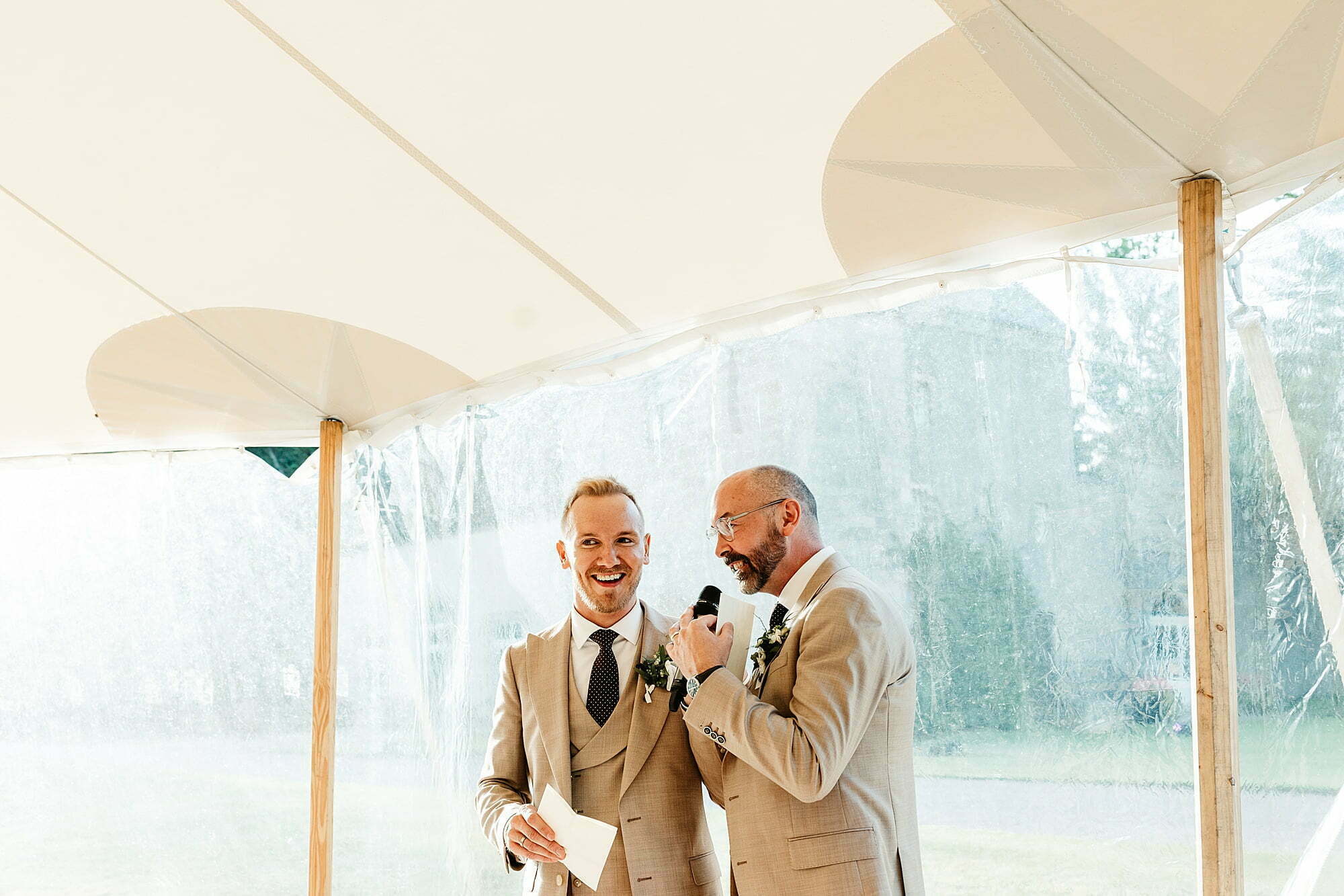 marquee wedding reception at gordon castle wooden speeches same sex couple two grooms