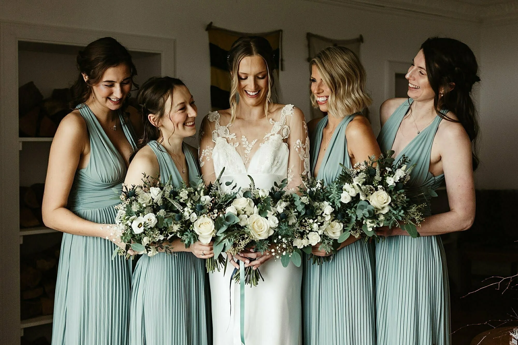 guardswell farm winter wedding bride and bridesmaids david fielding dress green bridesmaid dress bramble and thyme flowers