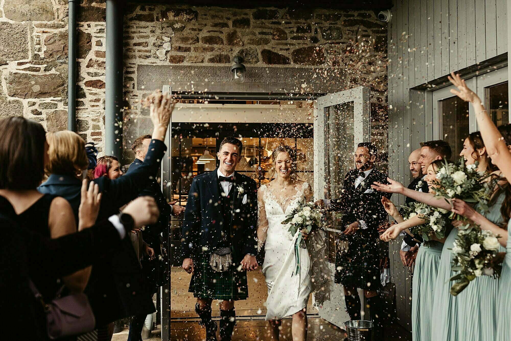 guardswell farm winter wedding confetti bride and groom