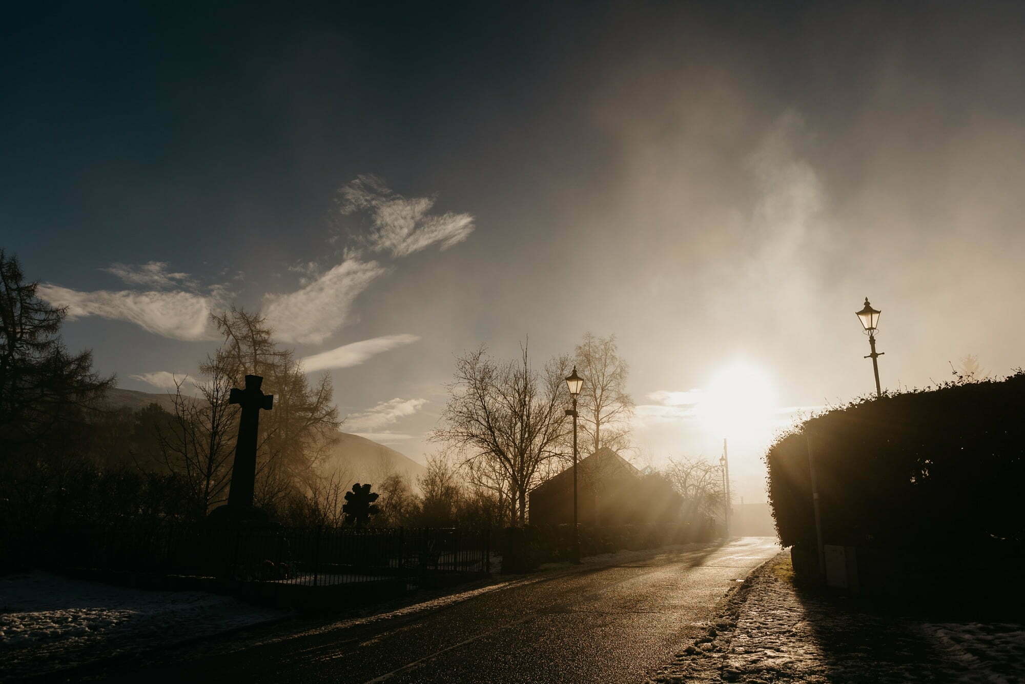 The fife arms braemar winter sun across the road outside hotel