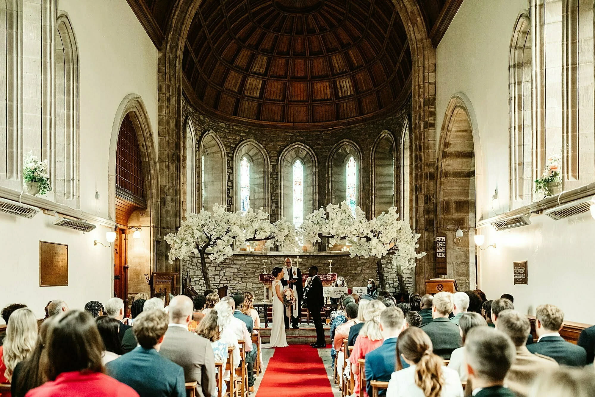 summer drumtochty castle wedding church St Palladius interior inside kim dalglish floral arch