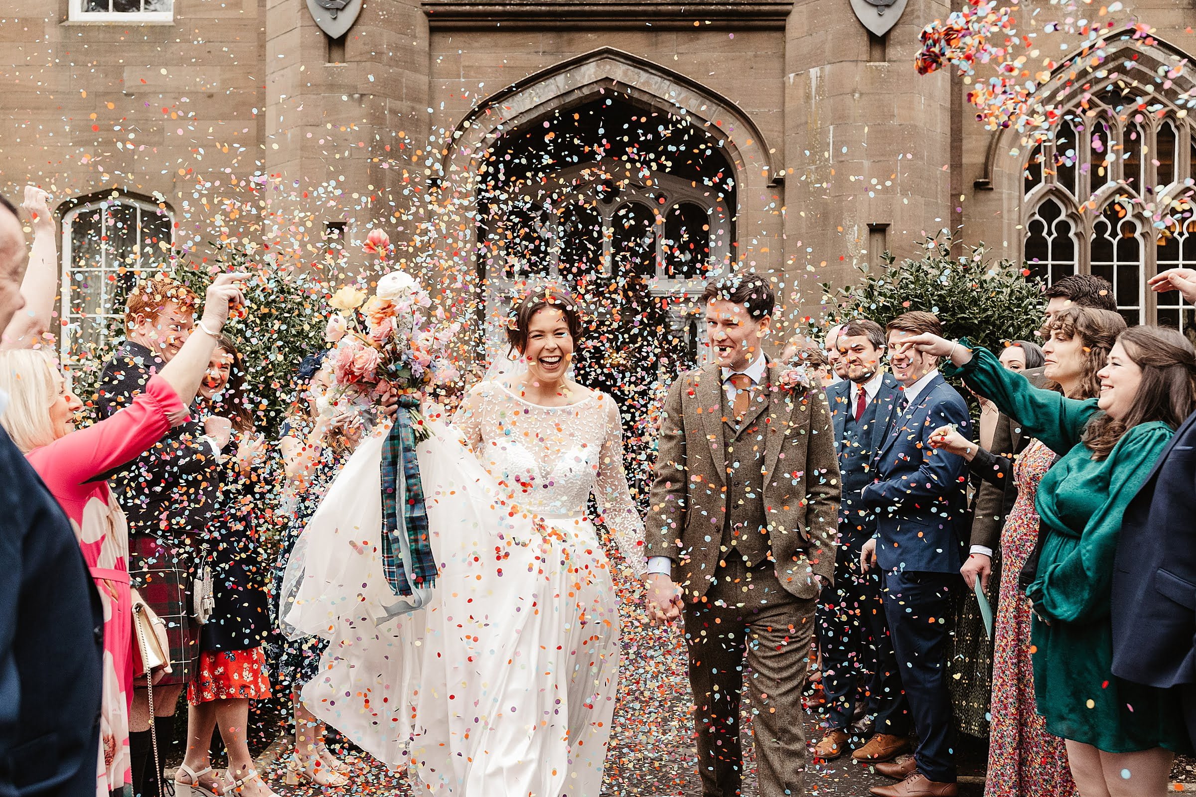 Drumtochty castle confetti throw bride and groom colourful