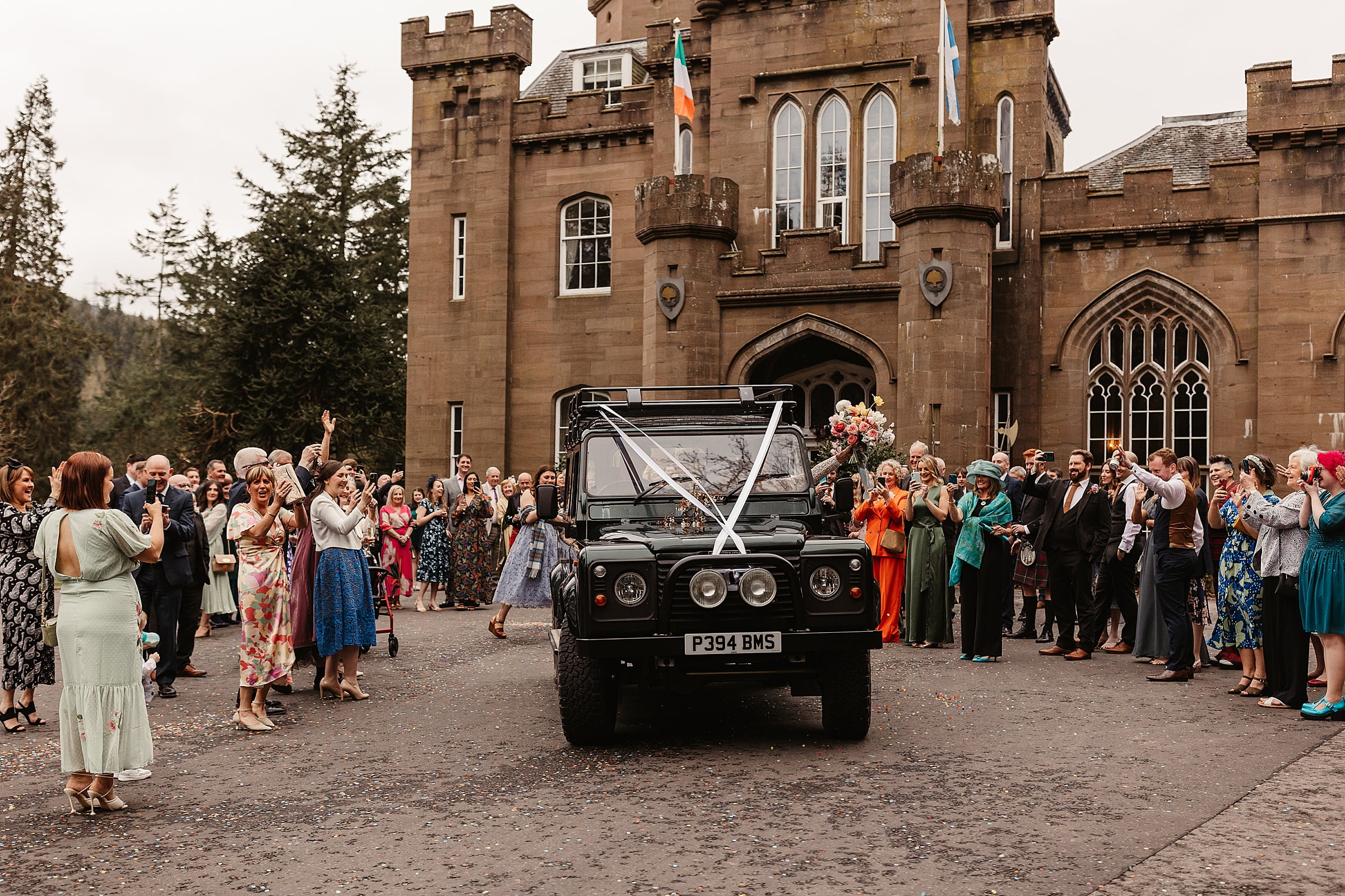 Drumtochty castle wedding photos landrover wedding car exit