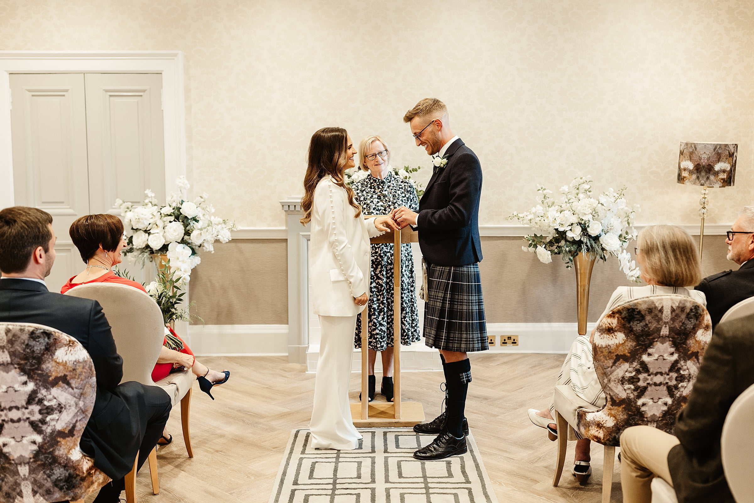 bride and groom ceremony room edinburgh city chambers elopement