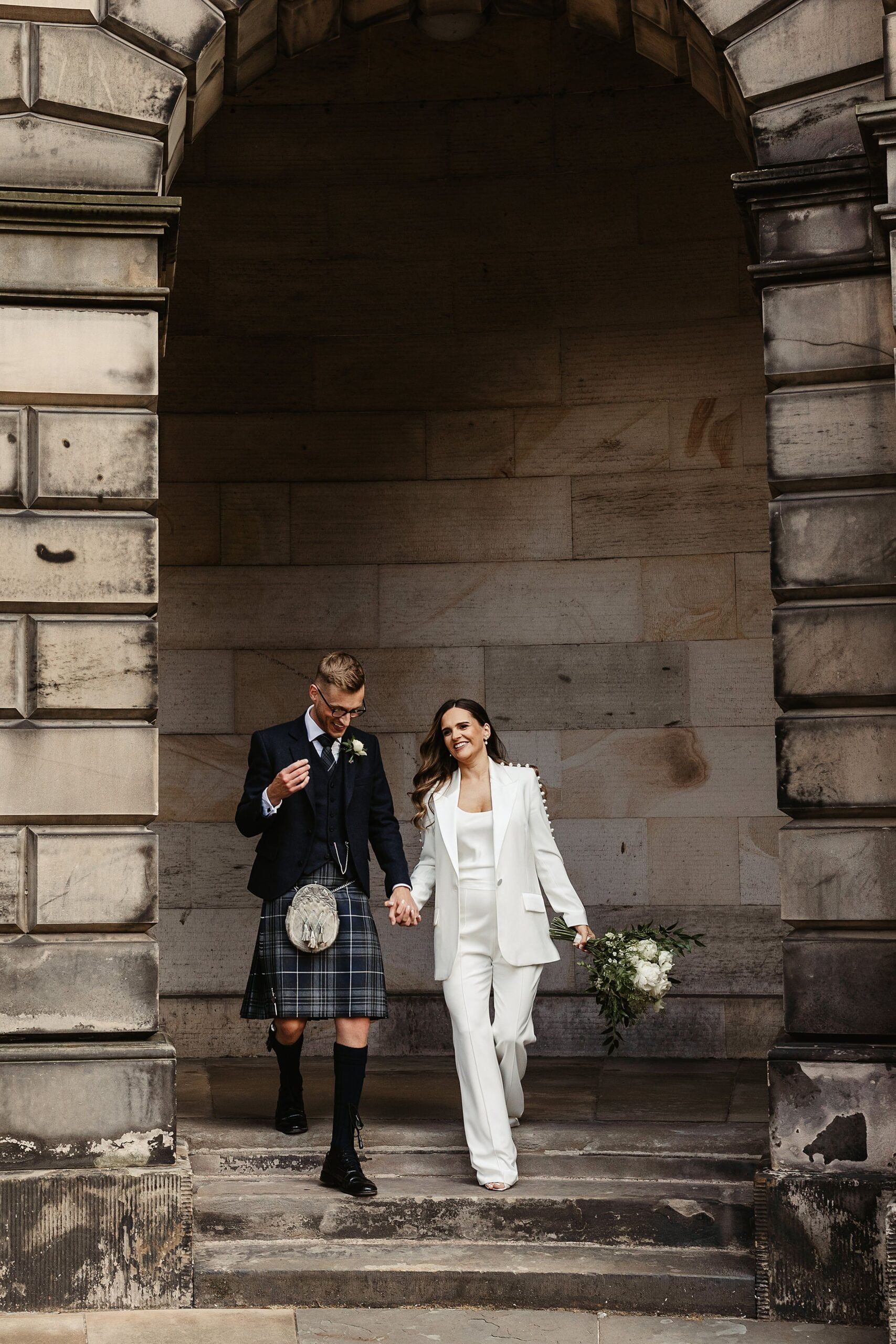 Edinburgh city chambers elopement photography bride and groom portrait Nadine Merabi trouser suit