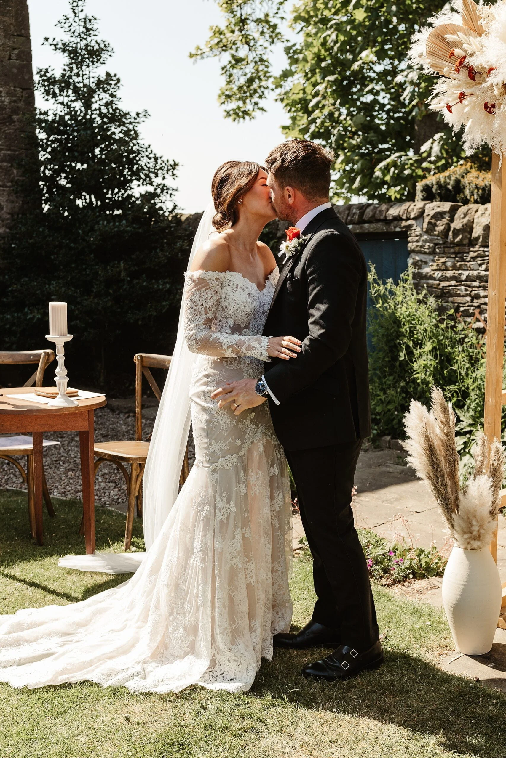 woodwrae farm wedding forfar bride and groom first kiss marrime dress