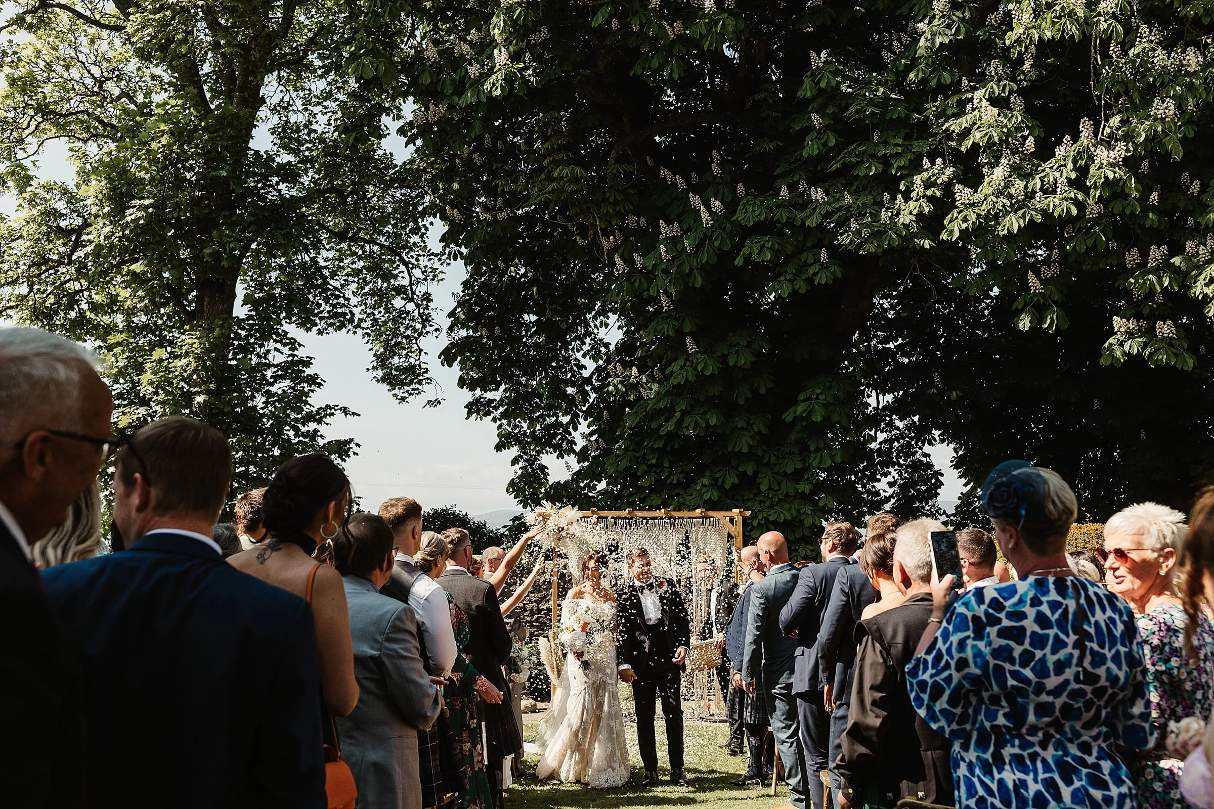 woodwrae farm wedding ceremony outdoors confetti