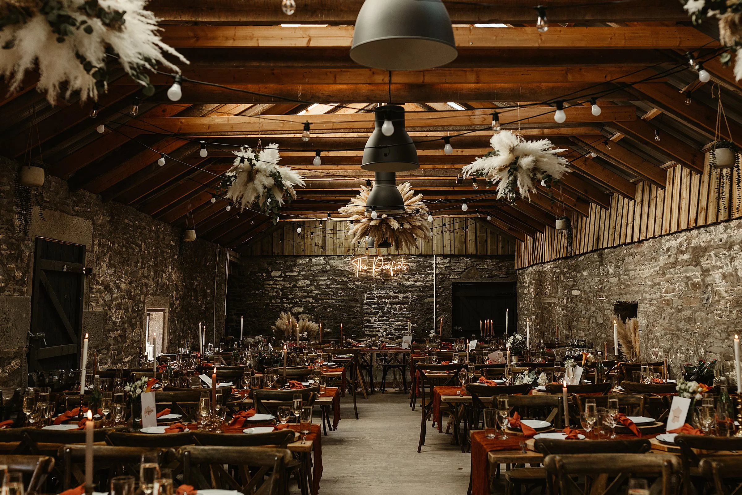 woodwrae farm wedding venue interior wooden tables