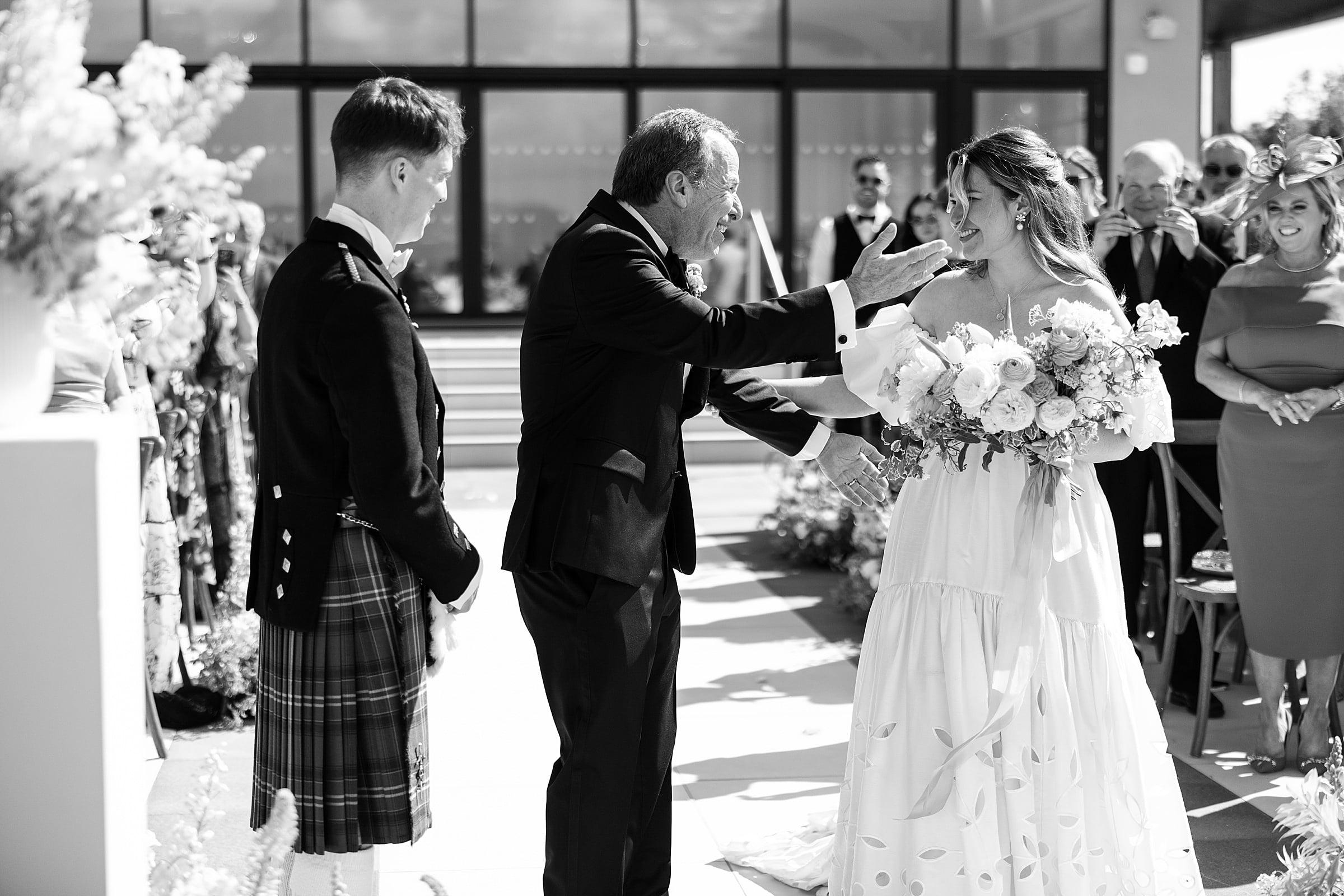 boturich castle wedding ceremony outdoors bride and father walking down the aisle