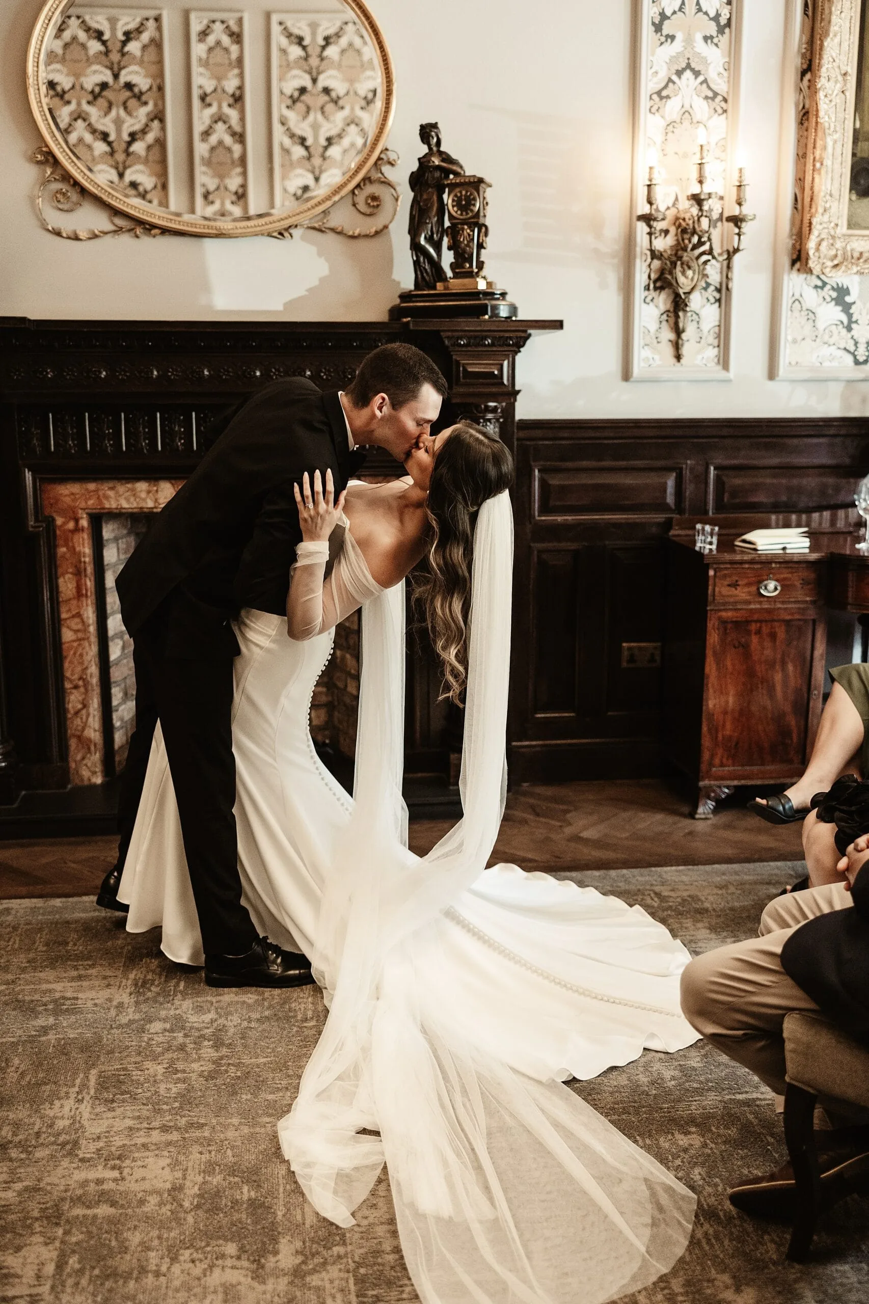 first kiss bride and groom intimate wedding ceremony indoors at the bonham hotel edinburgh