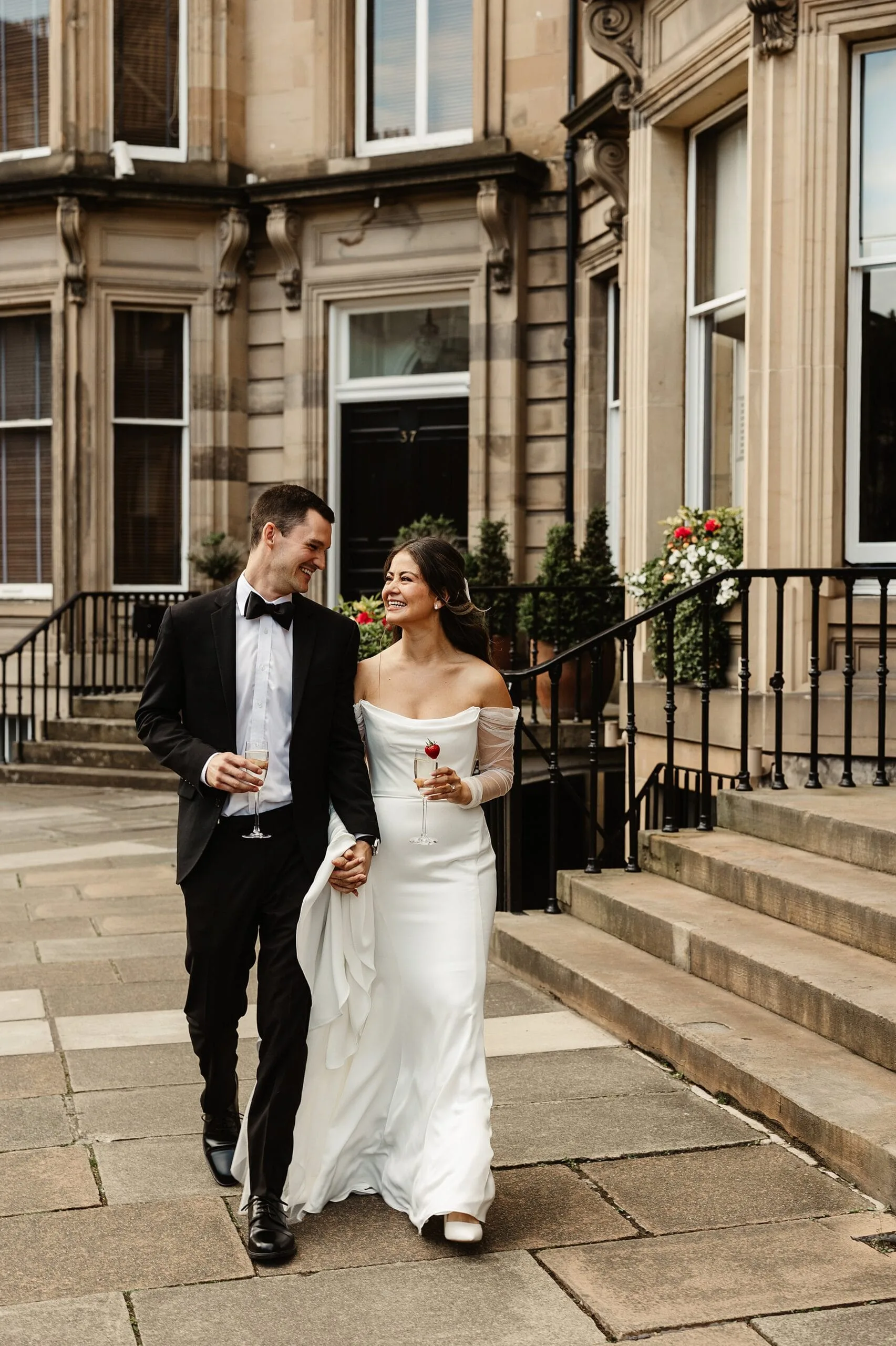 bride and groom wedding portraits edinburgh city centre elegant jenny yoo dress