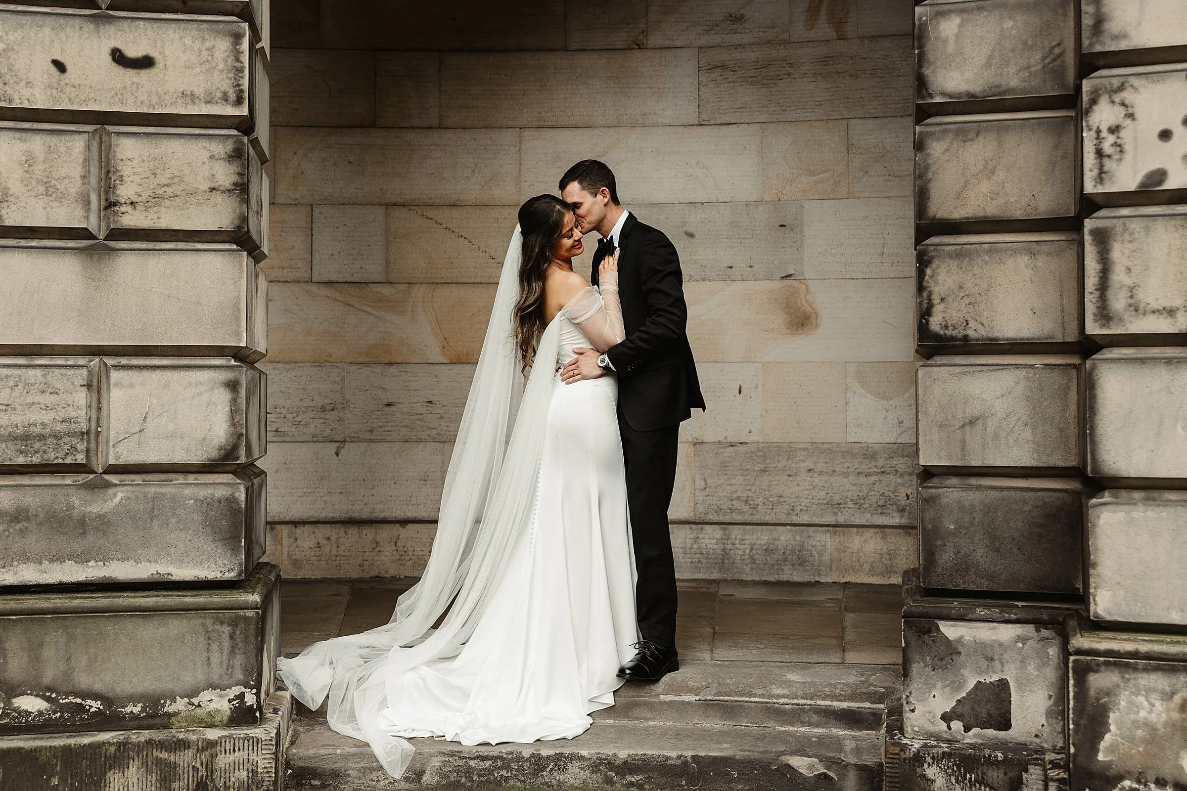 bride and groom wedding portraits edinburgh city centre elegant jenny yoo dress