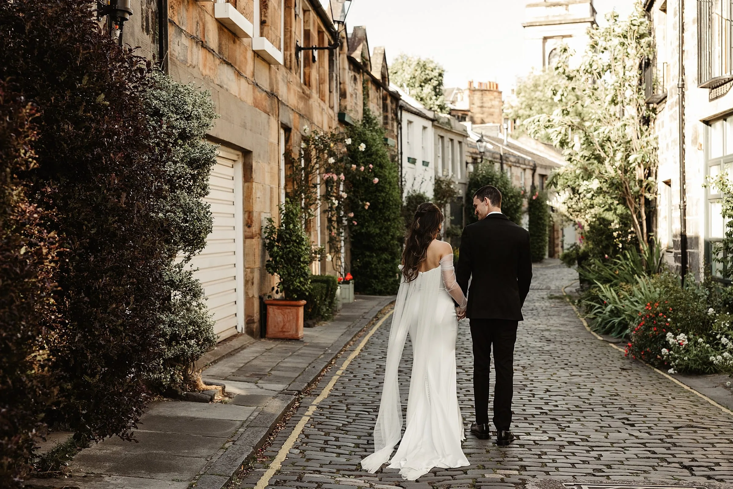 bride and groom wedding portraits edinburgh city centre elegant jenny yoo dress