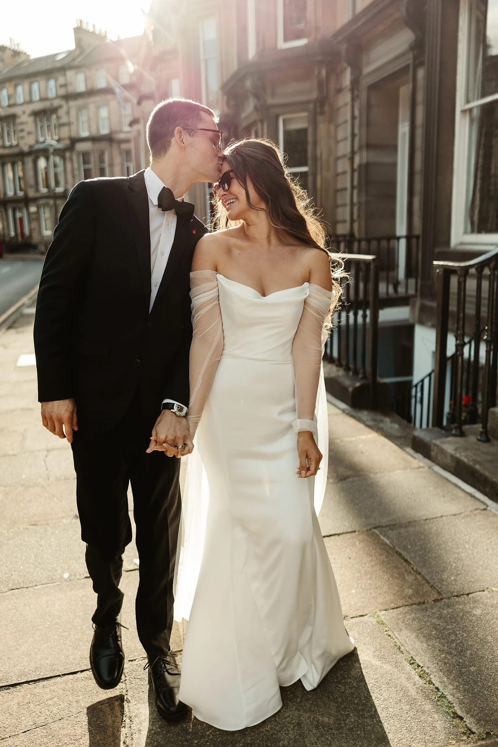 bride and groom wedding portraits edinburgh city centre elegant jenny yoo dress