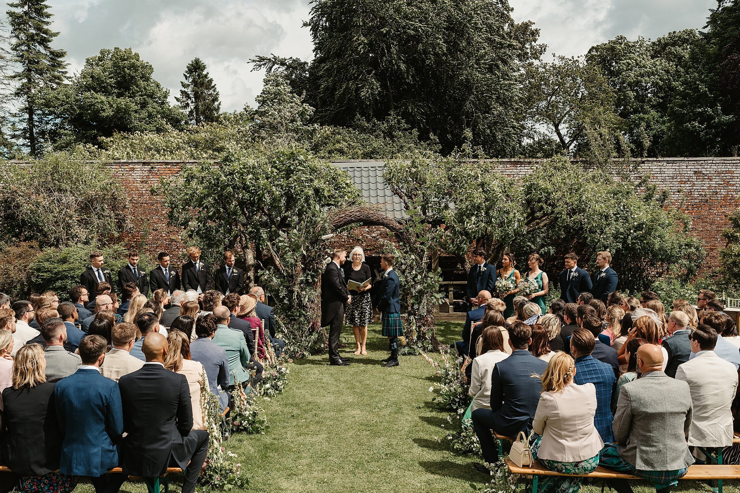 outdoor wedding ceremony at byre at inchyra same sex couple