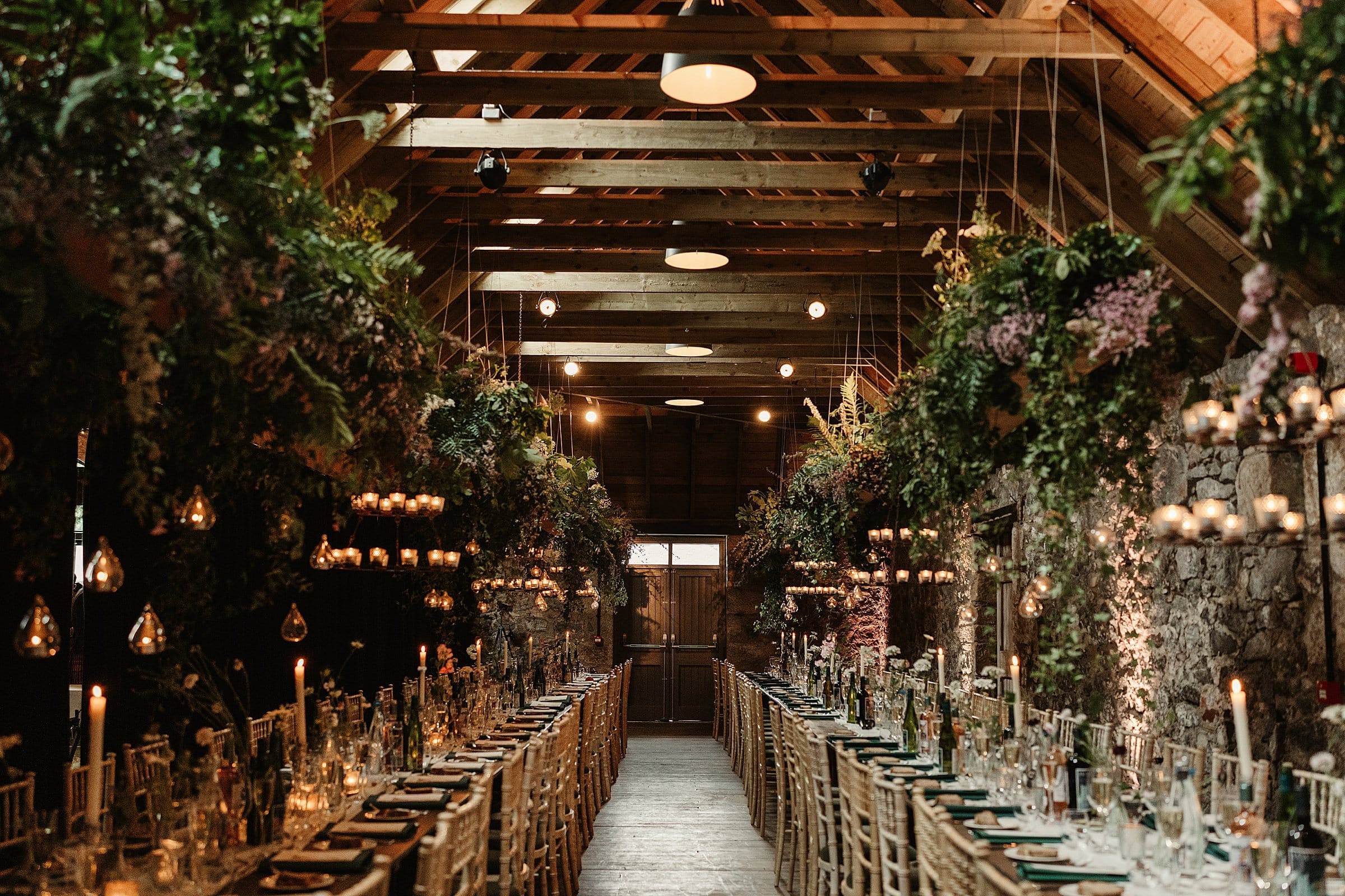 byre at inchyra wedding reception dinner setup myrtle and bracken flowers