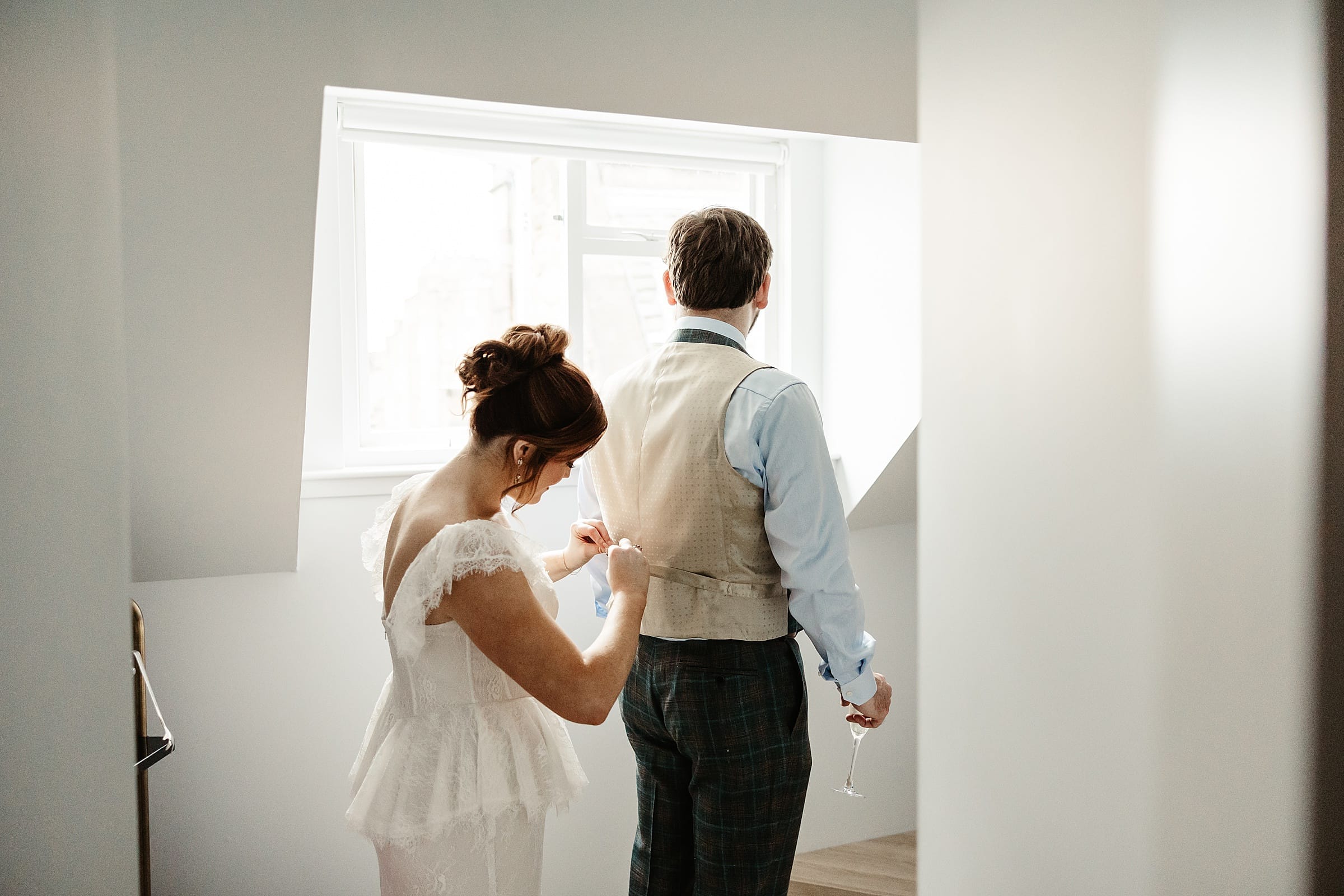 virgin hotels edinburgh elopement bride and groom getting ready together