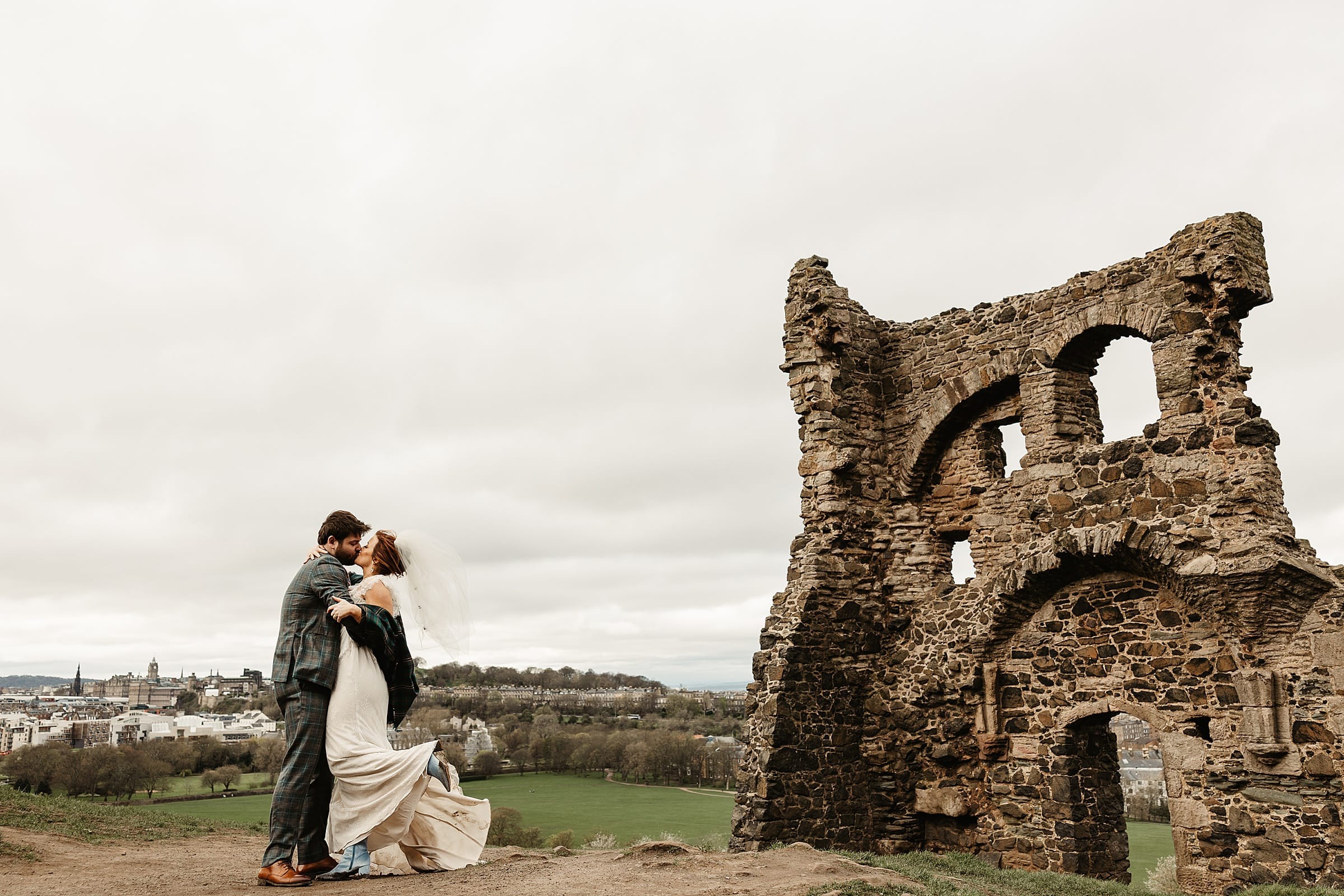 St Anthony's Chapel Ruins elopement wedding photography bride and groom first kiss