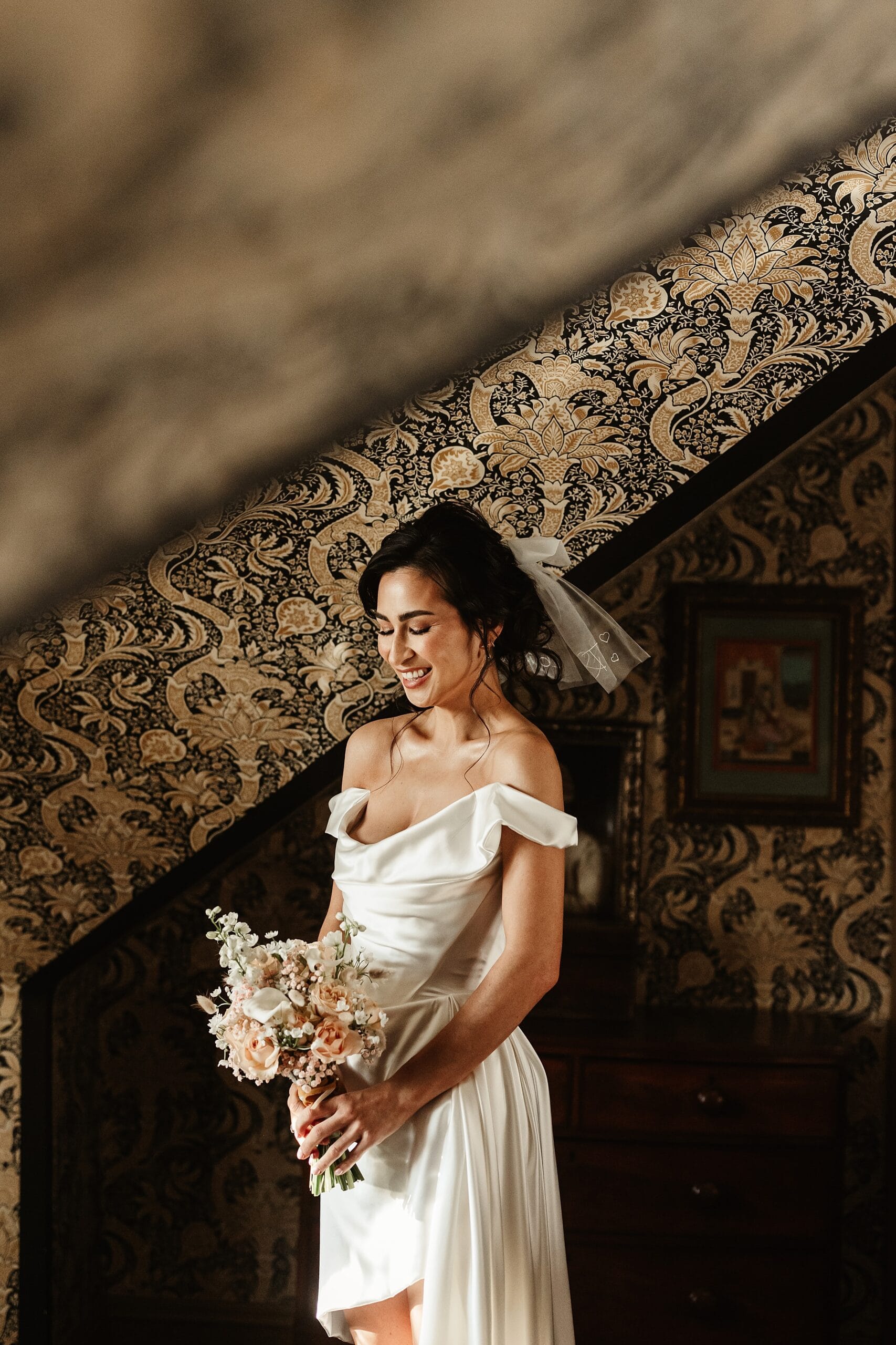 fife arms winter elopement bride portrait vivienne westwood dress coohill studio flower bouquet