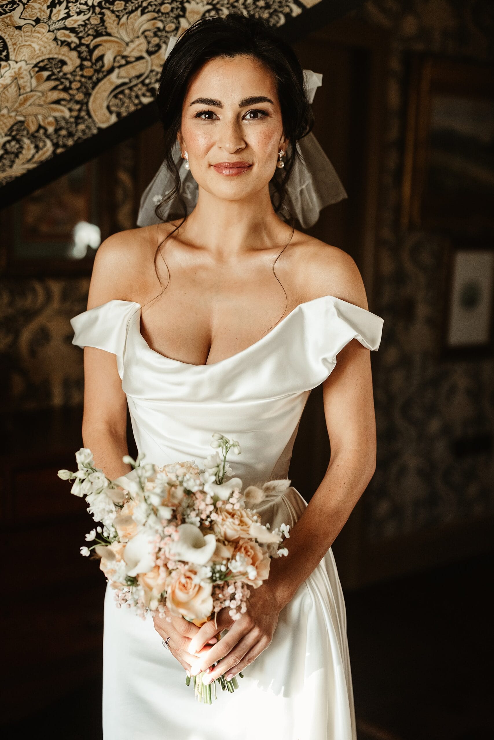 fife arms winter elopement bride portrait vivienne westwood dress coohill studio flower bouquet