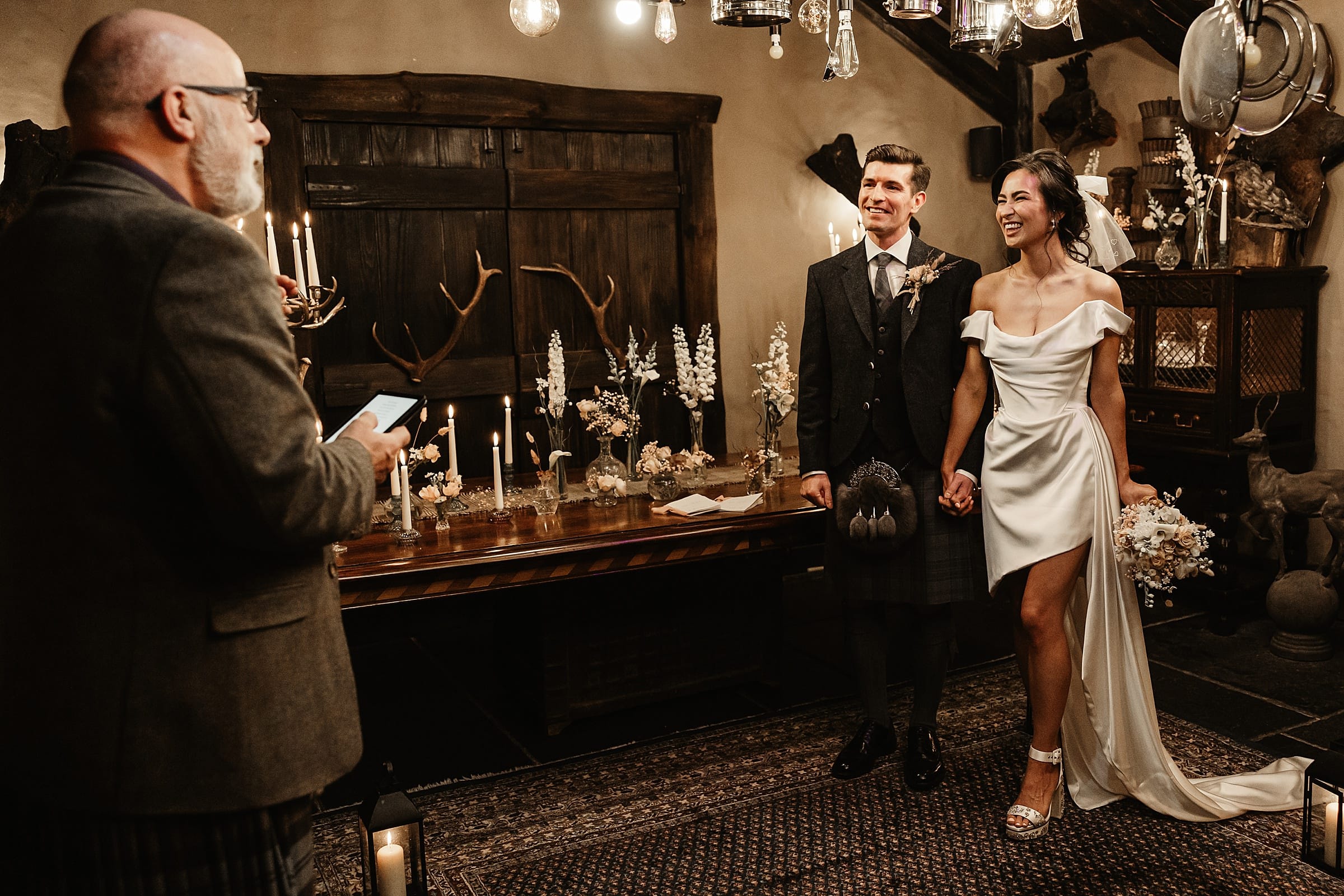 fife arms winter elopement wedding ceremony bride and groom vivienne westwood dress gary the humanist