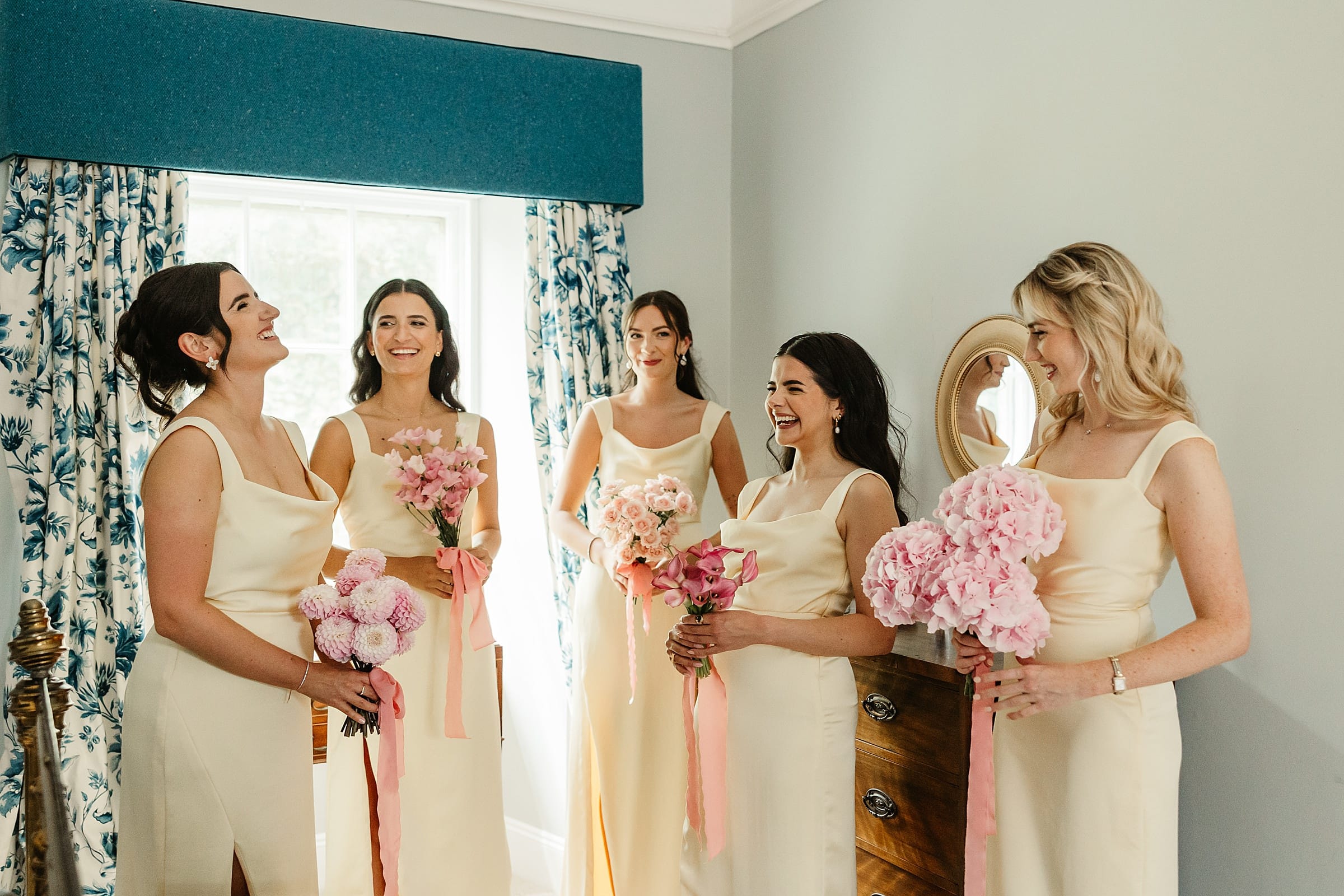 cluny castle wedding bridesmaids yellow dresses and pink bouquets fauna flower folk