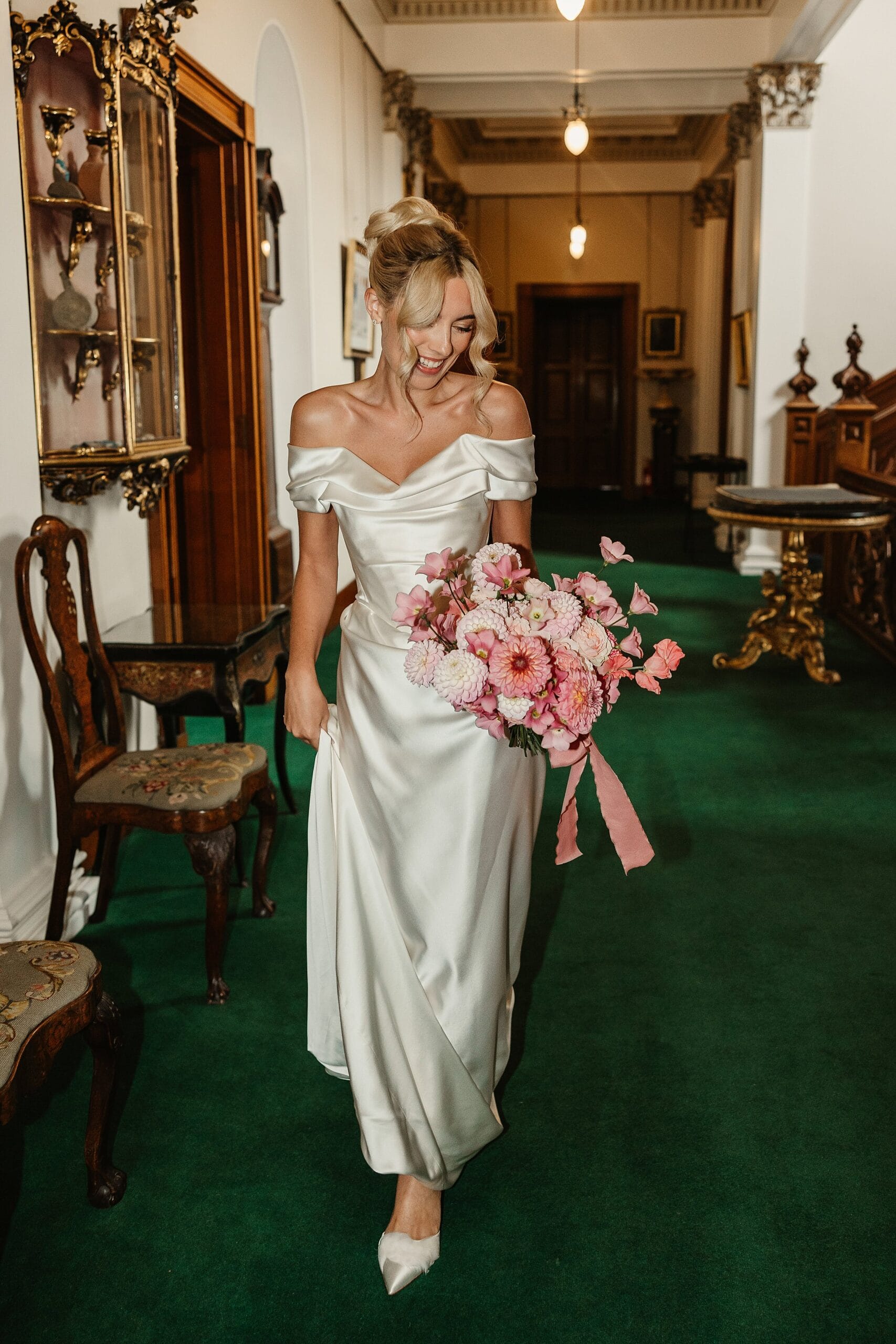 cluny castle wedding bride portrait vivienne westwood pink florals fauna flower folk bouquet indoors