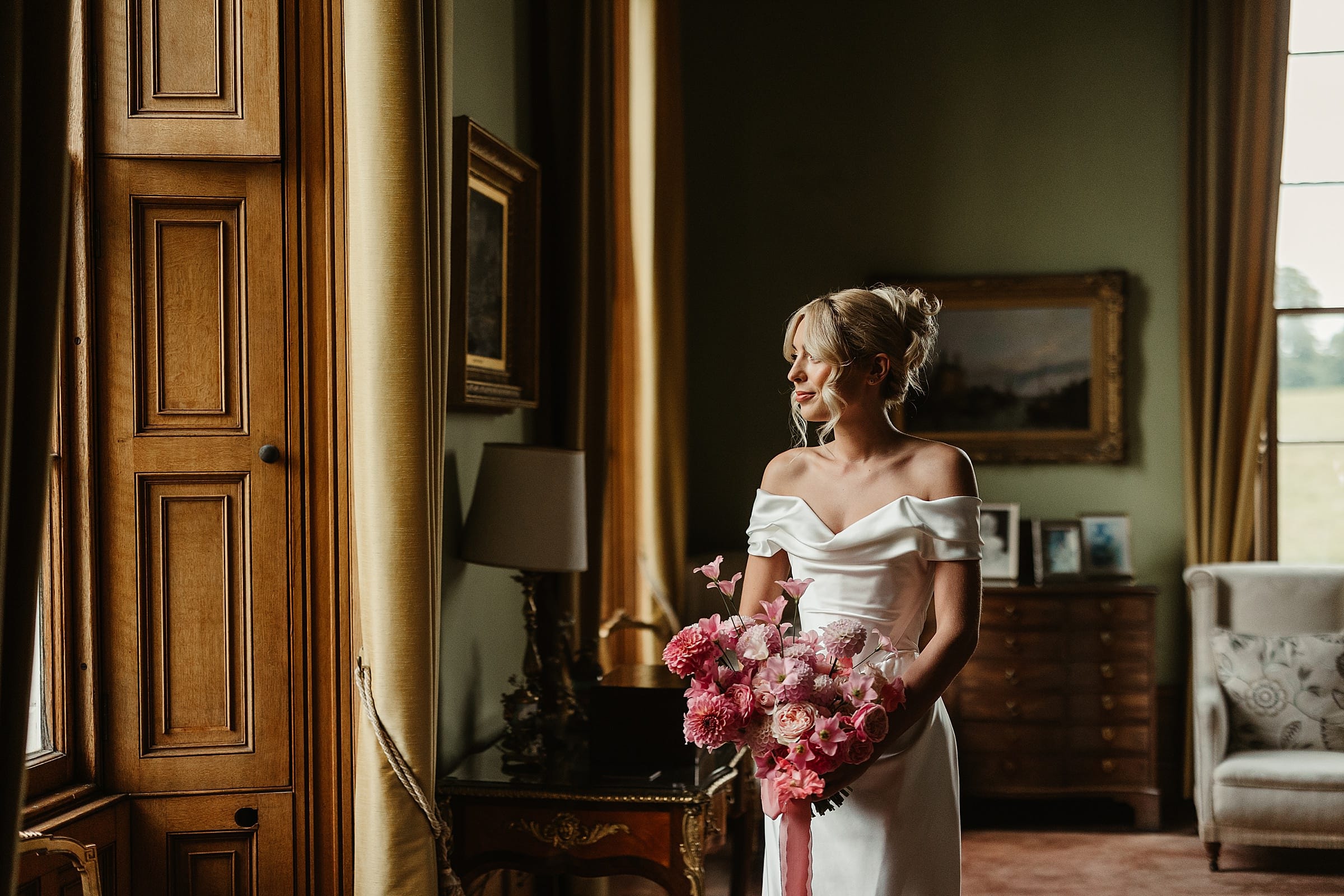 cluny castle wedding bride portrait vivienne westwood pink florals fauna flower folk bouquet
