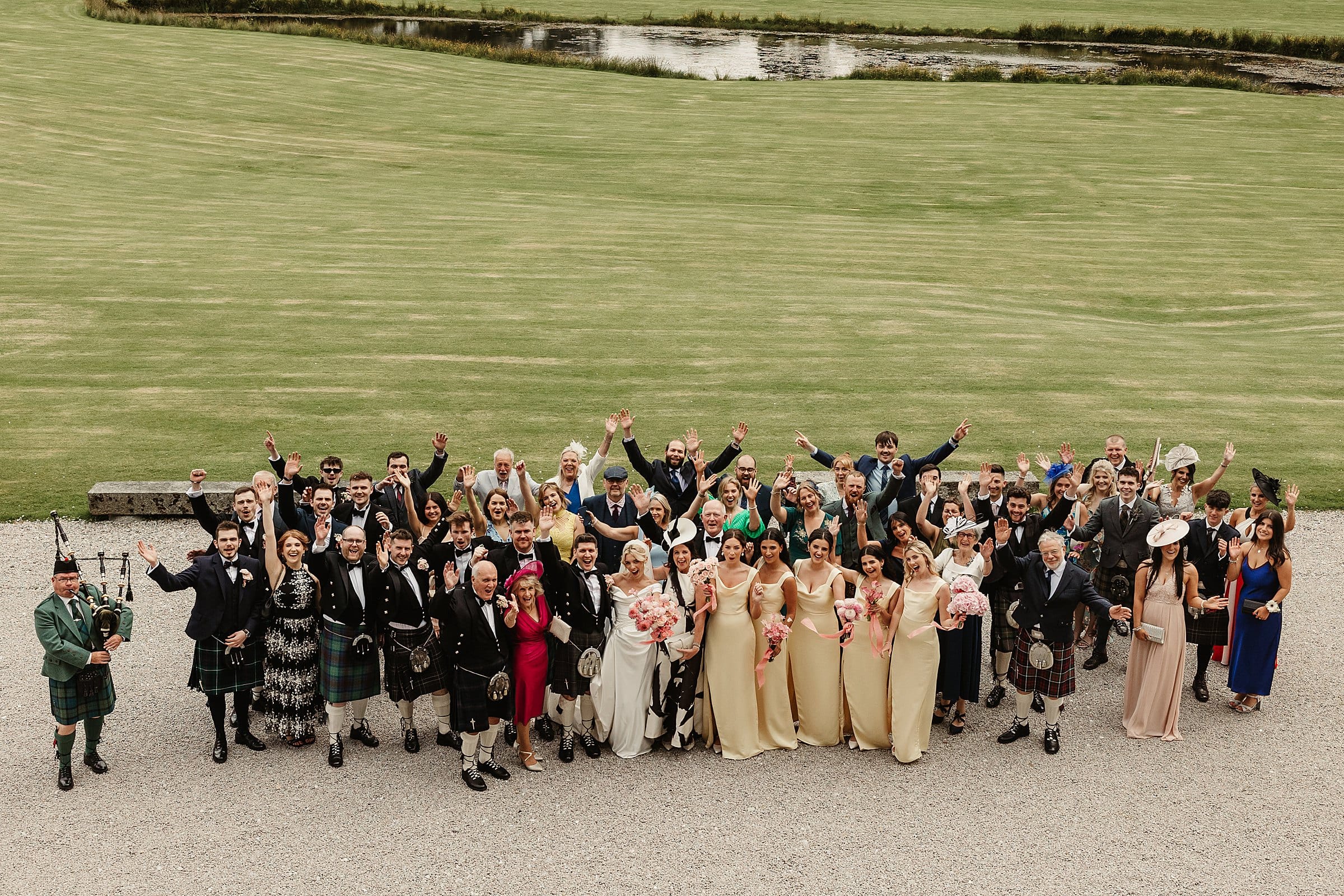 cluny castle wedding big group photo main entrance