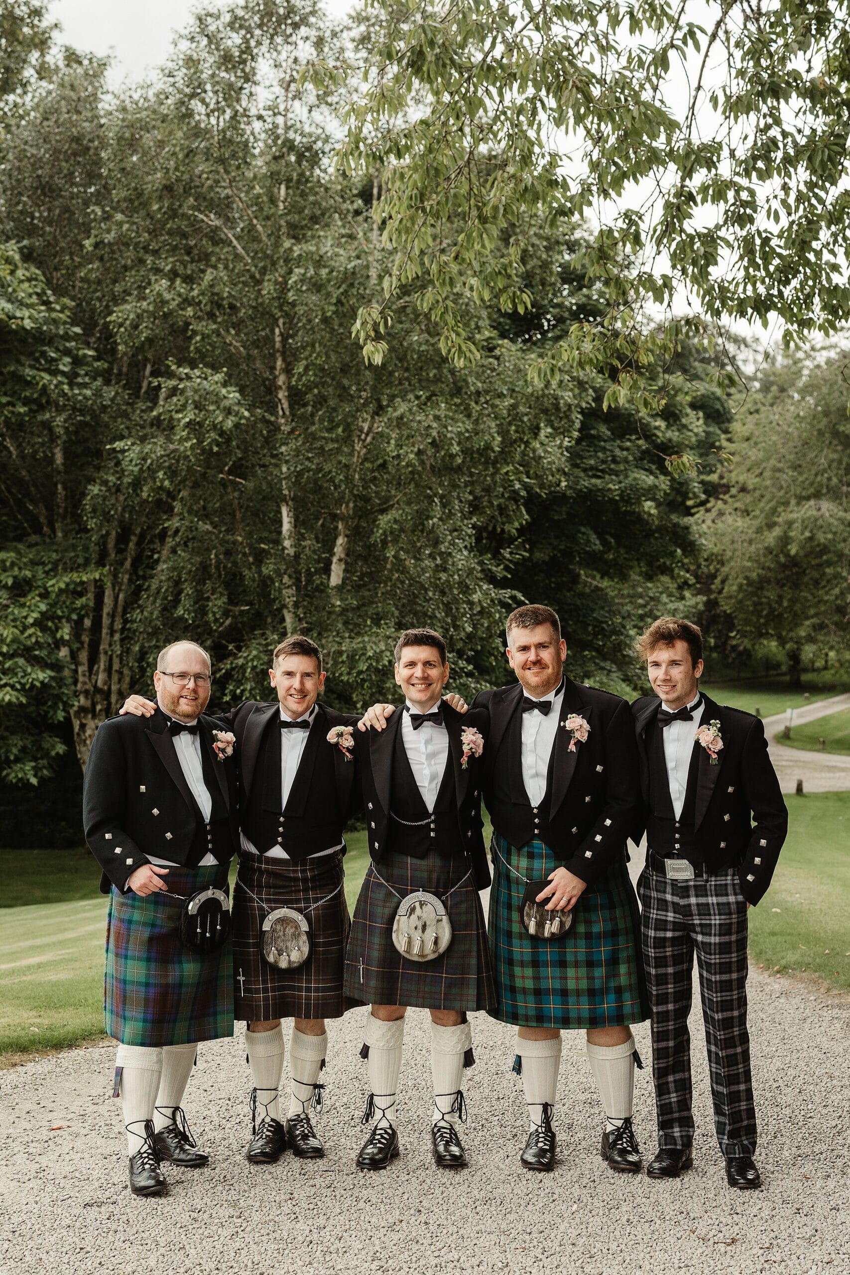 cluny castle wedding photography group photos groomsmen kilts