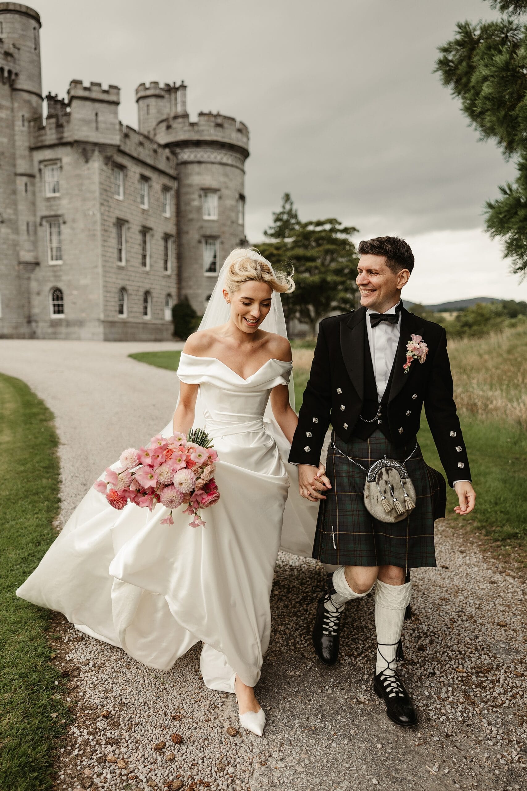 cluny castle wedding photography outdoors bride and groom portraits vivienne westwood dress