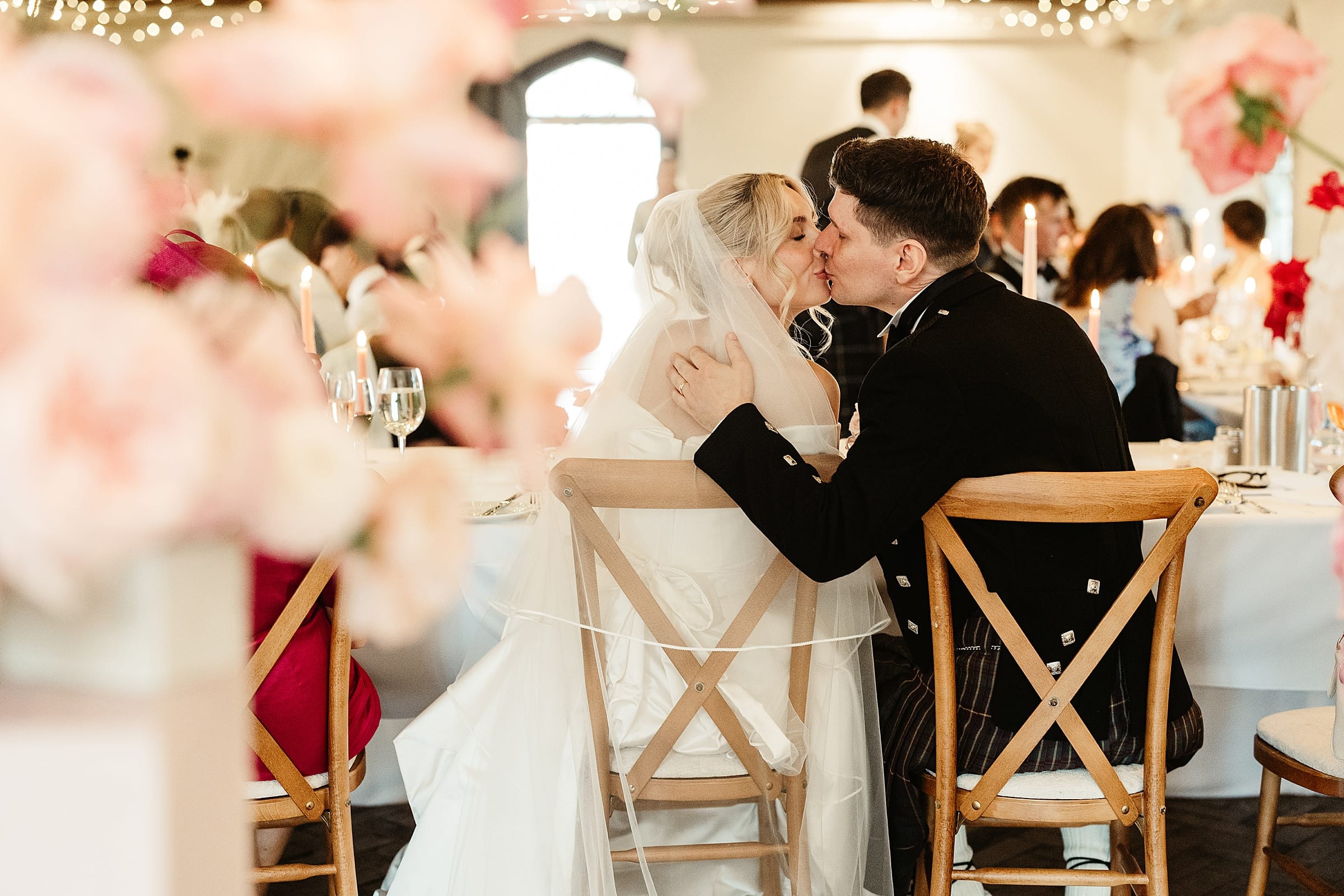 cluny castle wedding speeches bride and groom kissing